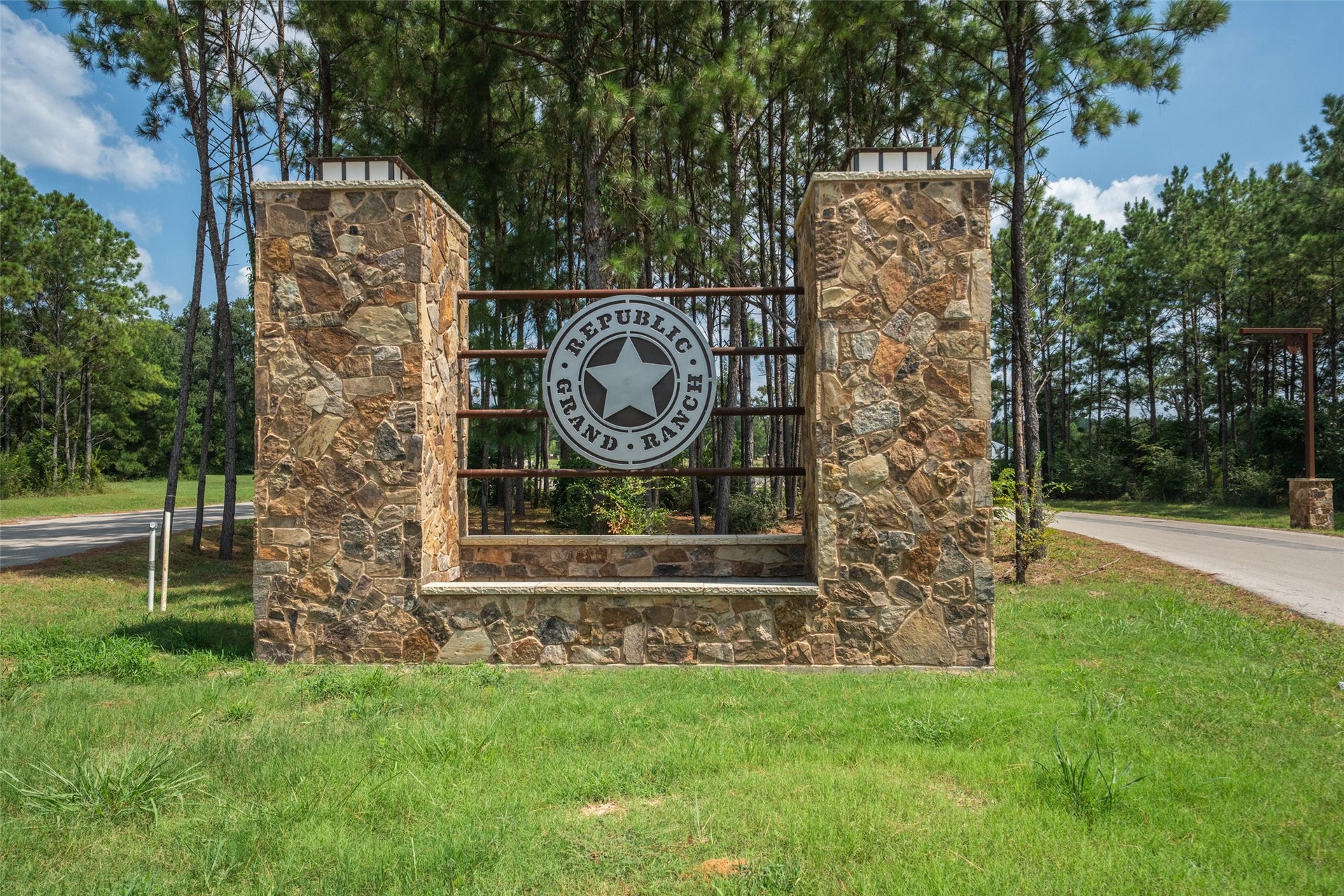 Republic Grand Ranch, a premier community featuring expansive green spaces, scenic walking trails, private parks, and well-maintained fishing ponds with docks for residents to enjoy.