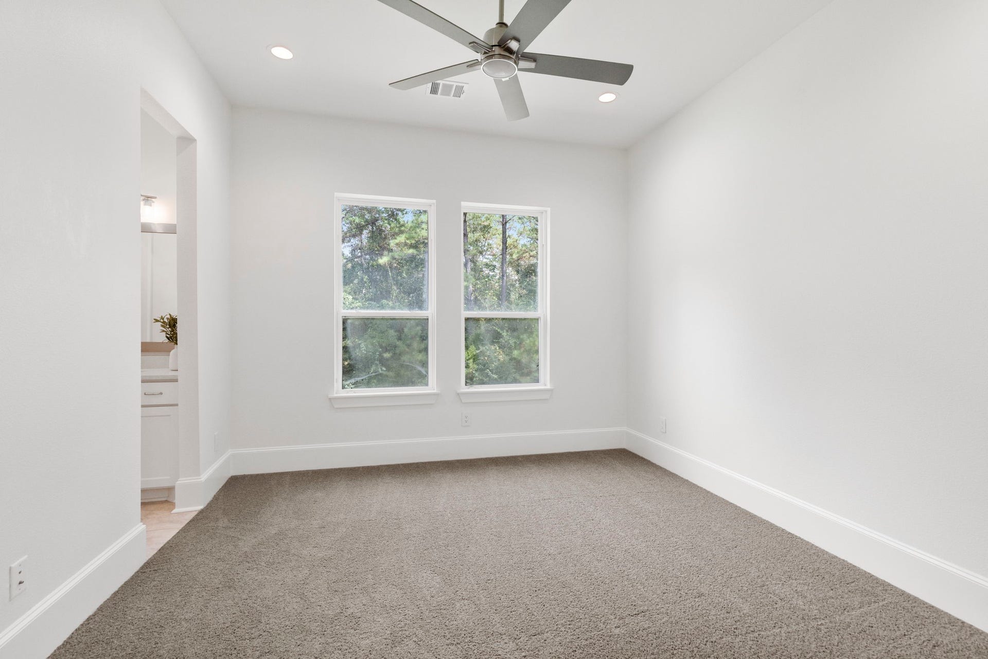 Bedroom two has great windows and a ensuite bath for convenience.