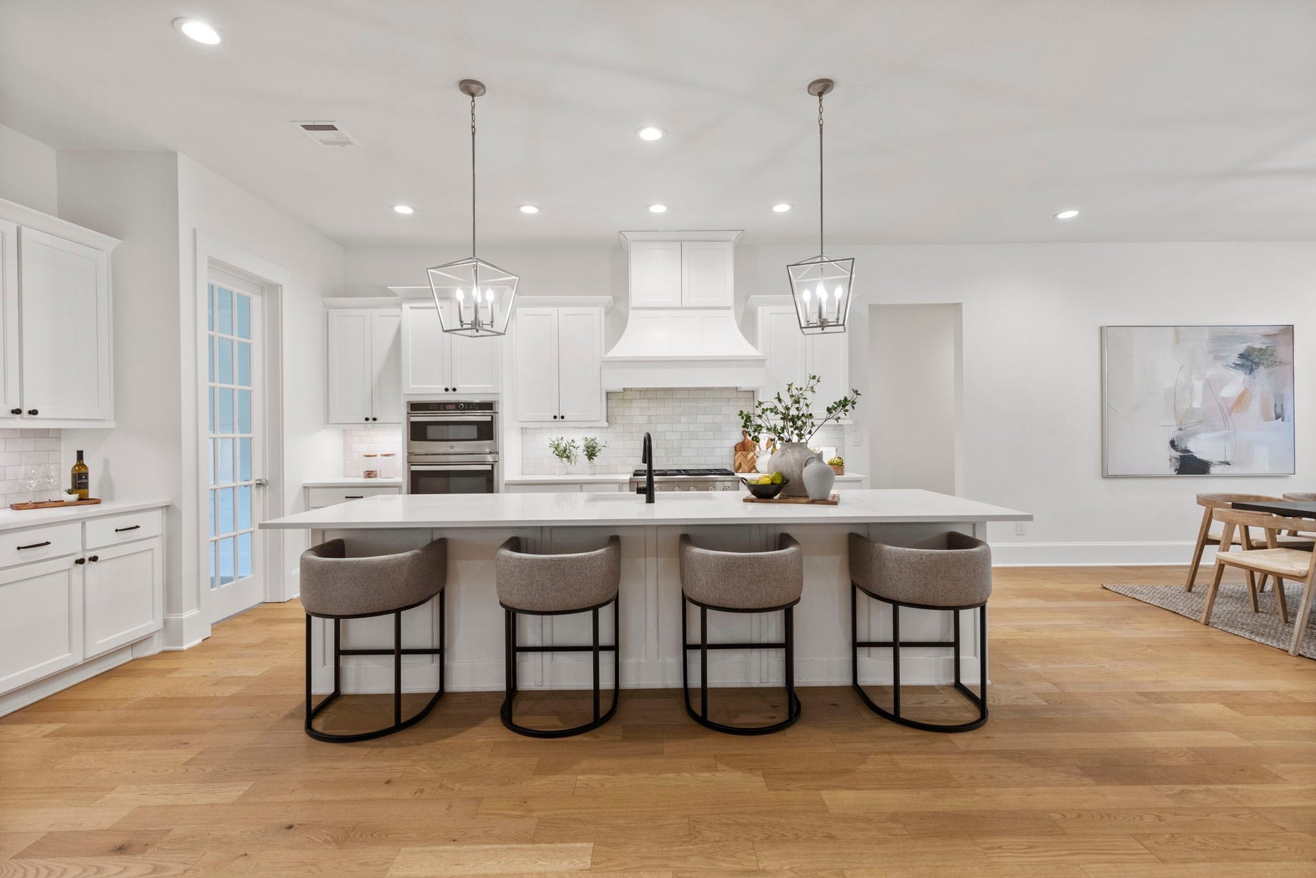 This dreamy kitchen features high-end finishes and thoughtfully designed amenities, creating the perfect space for culinary inspiration and everyday enjoyment.