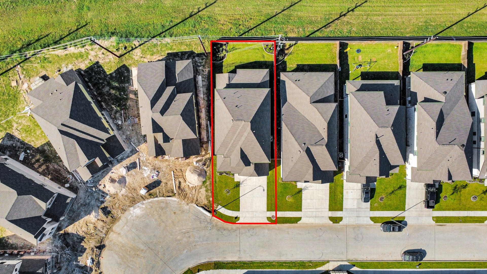 15111 Statice Trail, Houston, TX 77044 An aerial view of a spacious subdivision lot, highlighting a well-maintained yard and a fully fenced perimeter, offering both privacy and expansive outdoor space.