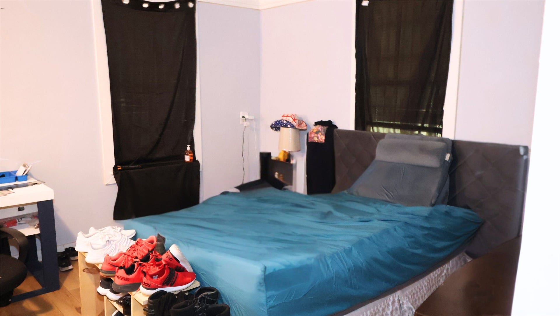 7029 Church Lane, Hitchcock, TX 77563 Cozy bedroom large enough for a queen size bed and nightstand. Features ample natural light from two windows.