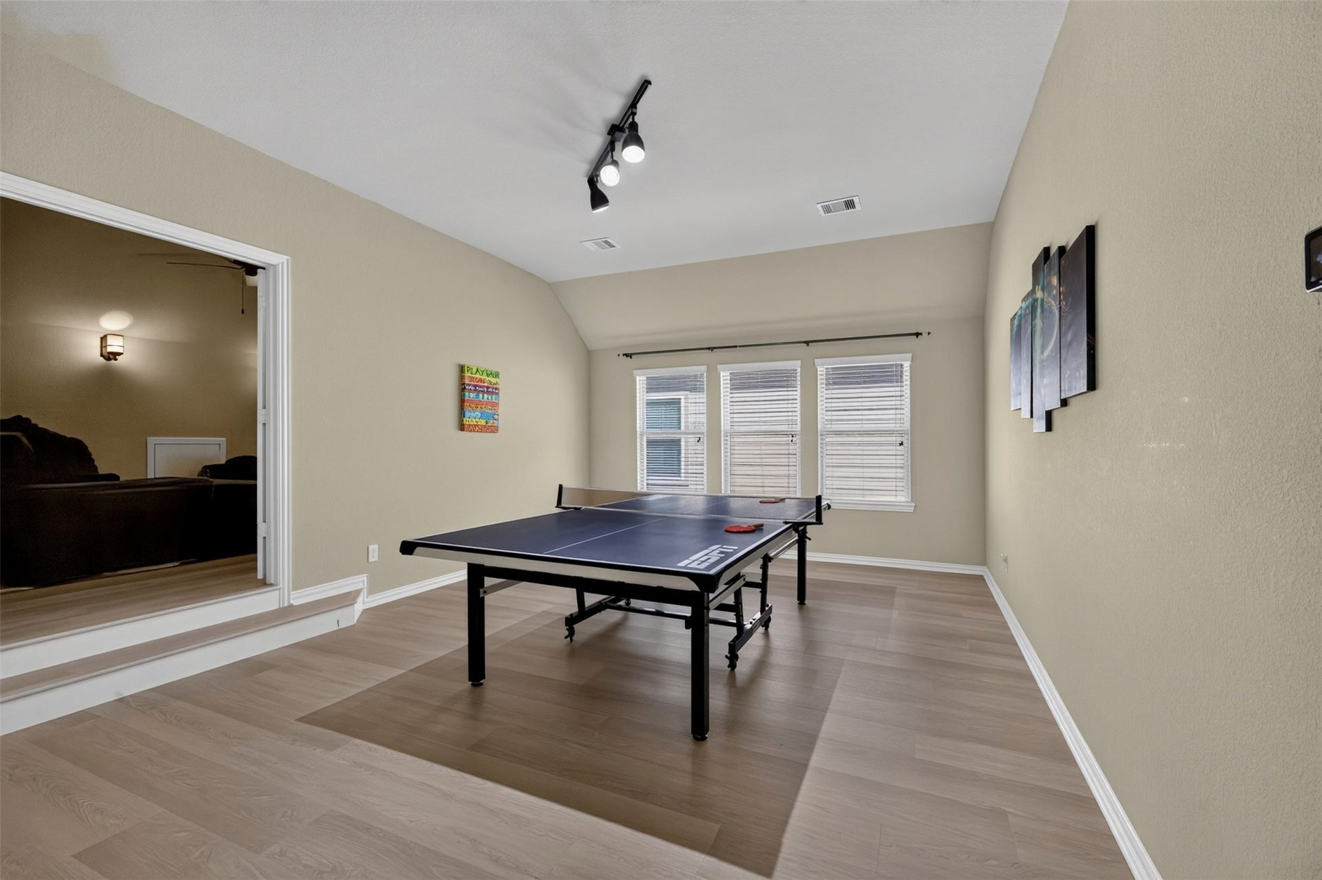 27818 Burchfield Grove Lane, Katy, TX 77494 Head upstairs to a spacious game room with plenty of room for a pool table, game tables, or your favorite entertainment setup. Natural light streams through the windows, creating an inviting space for recreation, hobbies, and gatherings with family and friends.