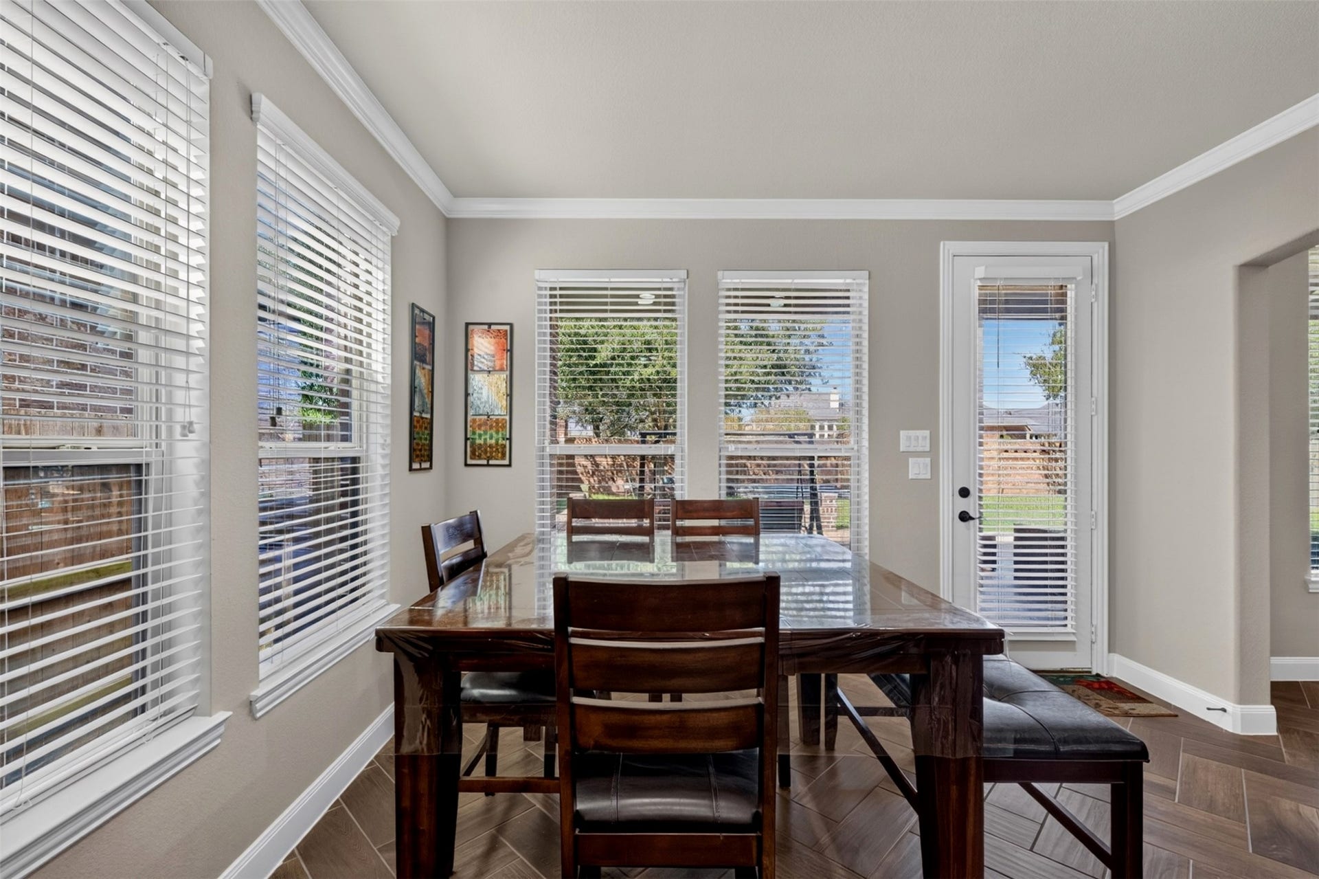 27818 Burchfield Grove Lane, Katy, TX 77494 Enjoy everyday dining surrounded by natural light from the multiple windows. With a door leading outside, this inviting space makes it easy to transition from breakfast indoors to coffee or conversation on the patio.