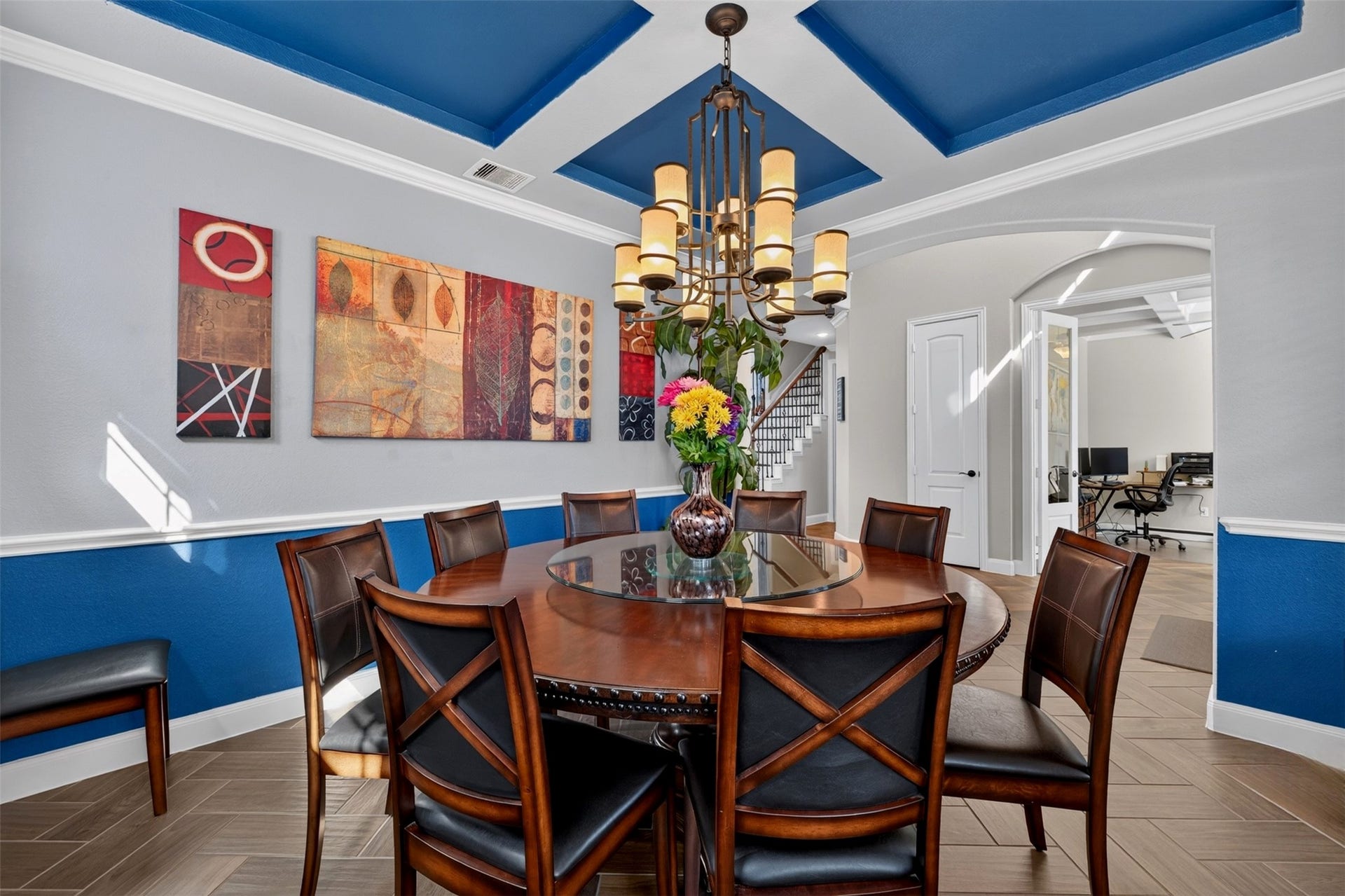 27818 Burchfield Grove Lane, Katy, TX 77494 From another angle, the dining room's architectural details take center stage. The tray ceiling, decorative wall trim, and open connection to the entry and adjoining spaces create a polished atmosphere for entertaining.