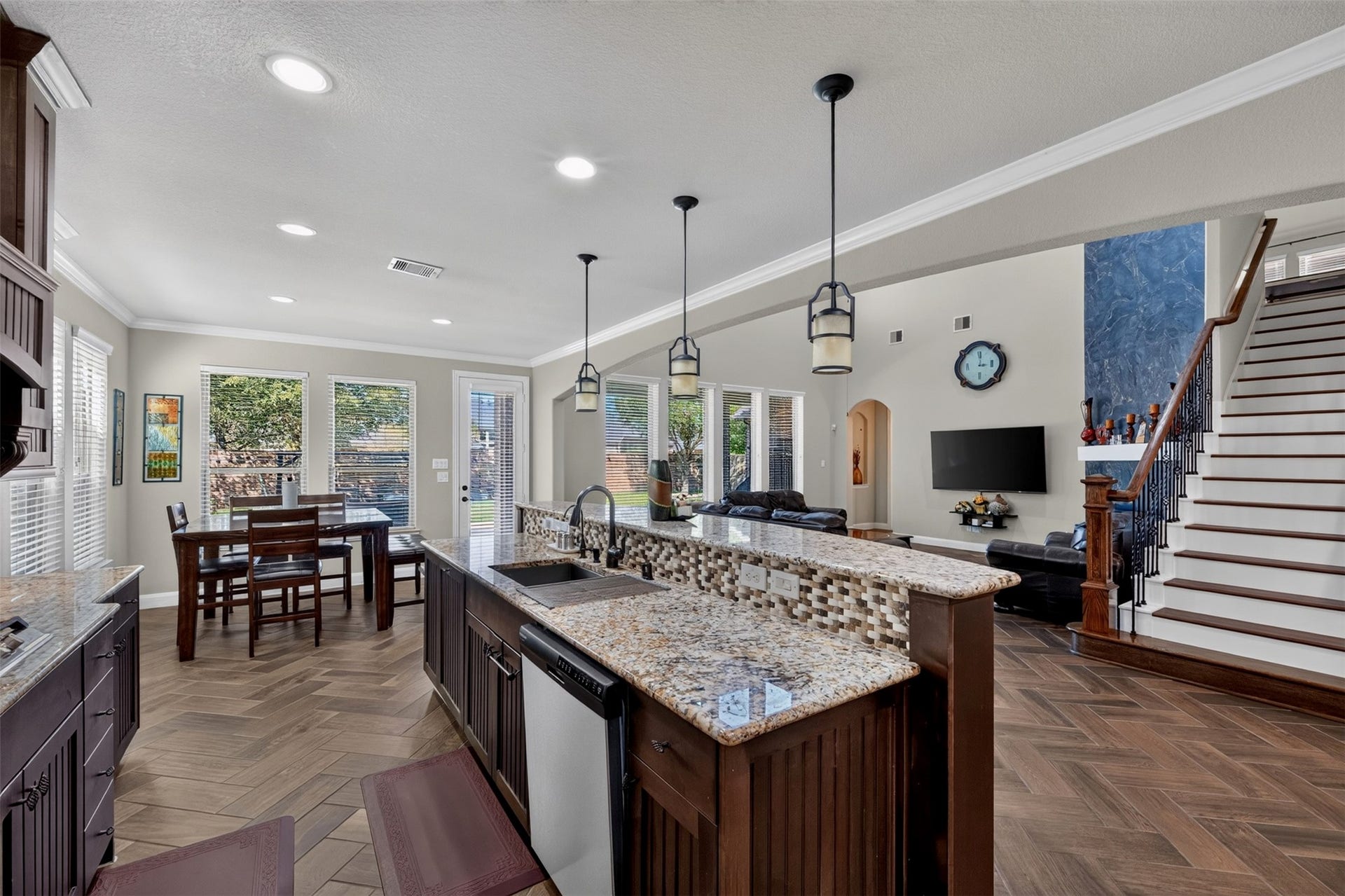 27818 Burchfield Grove Lane, Katy, TX 77494 The open layout keeps the kitchen connected to the heart of the home. Whether preparing dinner, helping with homework, or entertaining friends, you can stay part of the conversation while enjoying the spacious design.