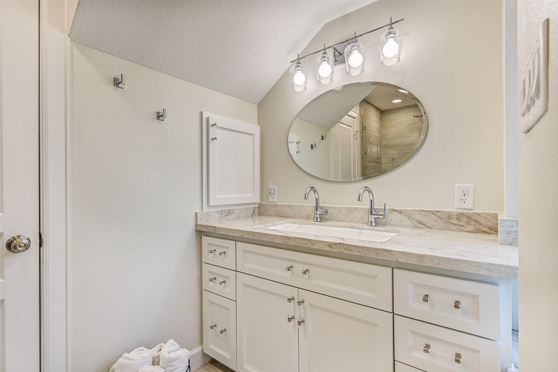 13414 Binnacle Way, Galveston, TX 77554 The en-suite bathroom offers marble countertops and a steam shower