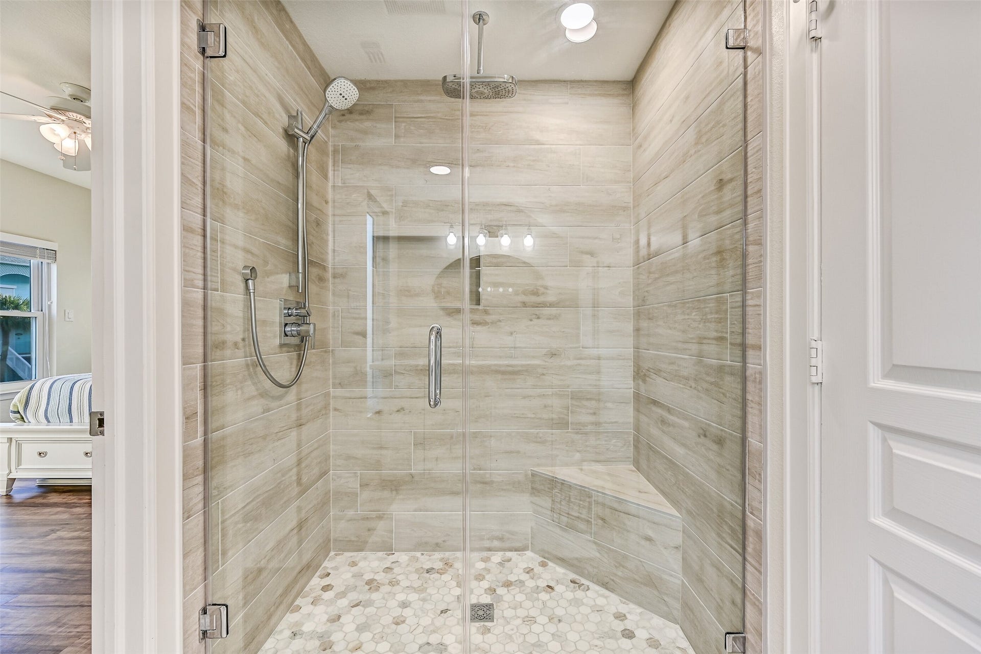 13414 Binnacle Way, Galveston, TX 77554 Notice the double shower heads and gorgeous tile surrounding in this shower!