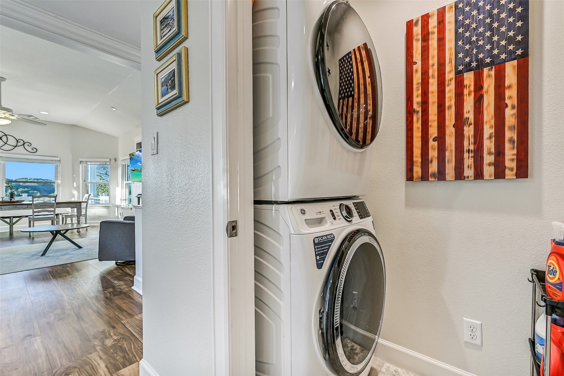13414 Binnacle Way, Galveston, TX 77554 Located off of the entry way is the laundry room with a large washer and dryer.