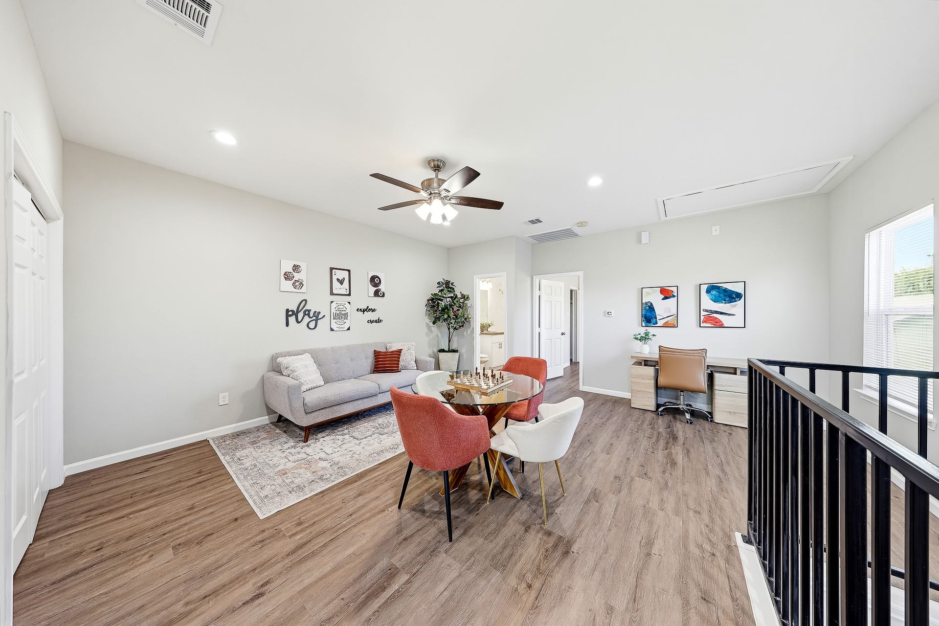 313 De Haven Street, Houston, TX 77029 Bring on game nights, this upstairs gathering space has room for fun, relaxation, and a creative corner.
