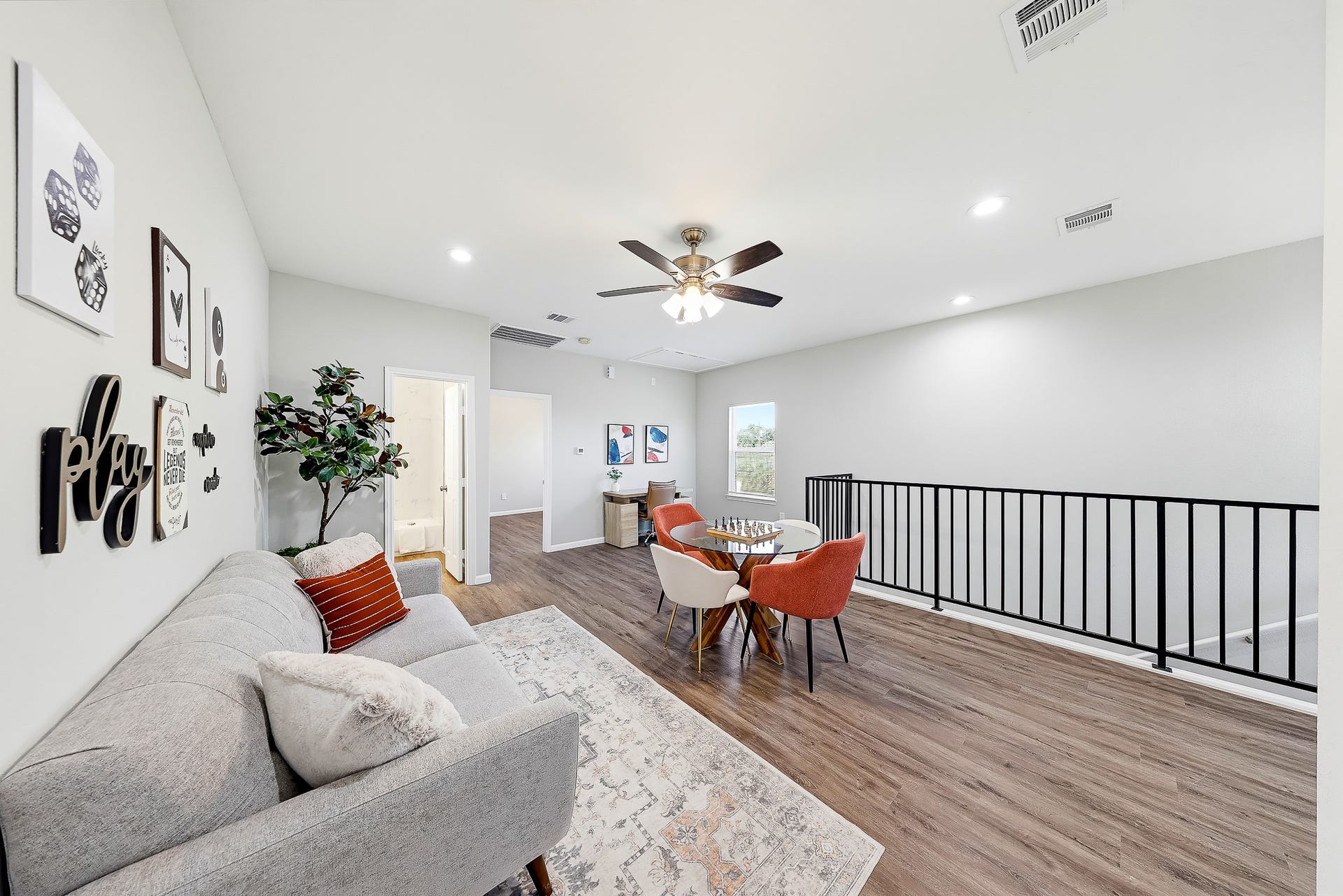 313 De Haven Street, Houston, TX 77029 A second living space upstairs lets game nights continue while the downstairs stays ready for relaxing.