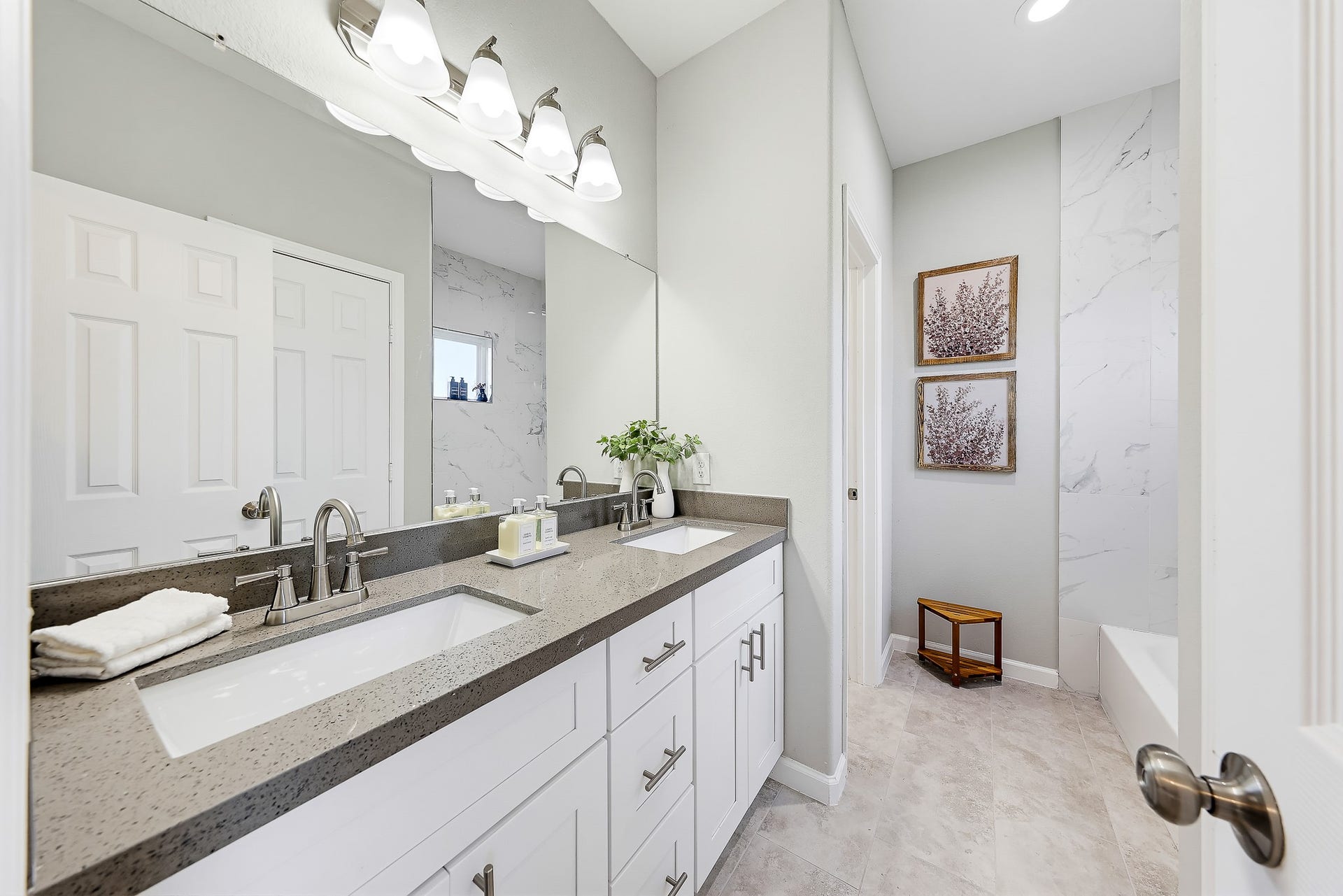 313 De Haven Street, Houston, TX 77029 Two sinks and generous mirror space make getting ready together a little easier.