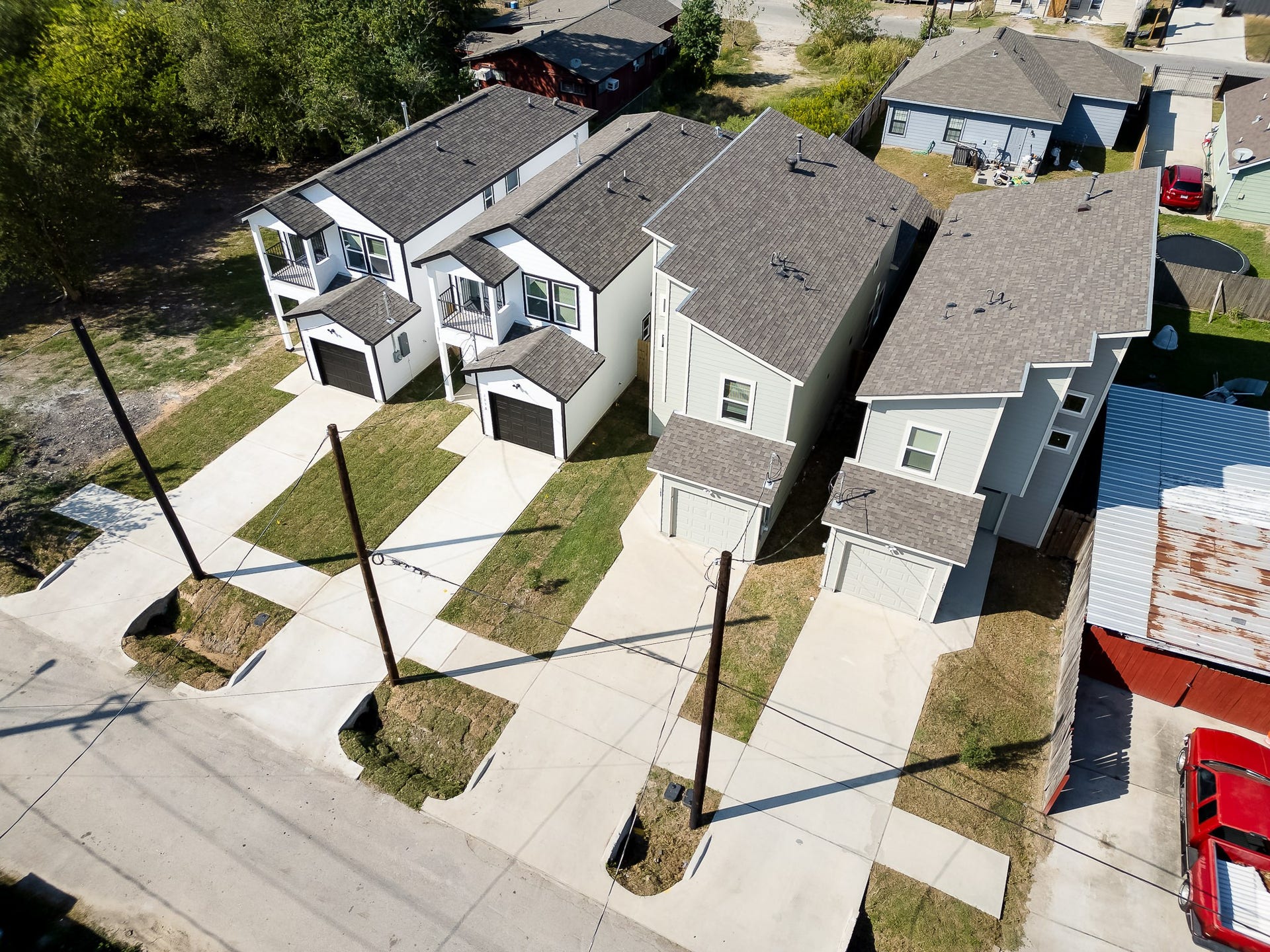 313 De Haven Street, Houston, TX 77029 An elevated view introduces your new home and its setting within an established neighborhood.