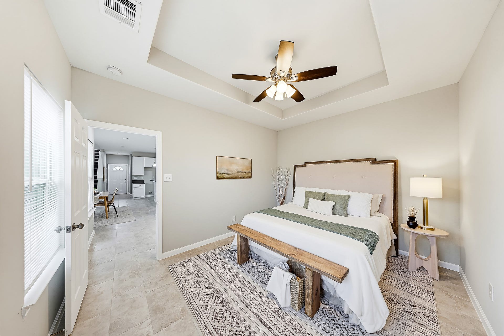 313 De Haven Street, Houston, TX 77029 Your downstairs primary retreat offers a restful place to recharge at the end of the day.