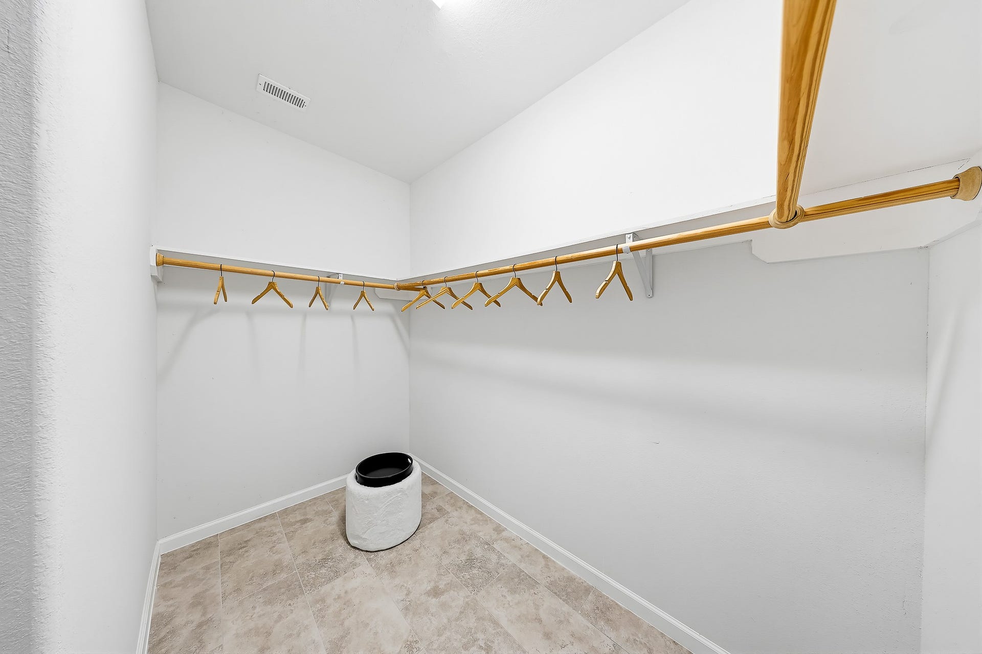 313 De Haven Street, Houston, TX 77029 Keep your wardrobe organized and your bedroom serene with a walk-in closet.