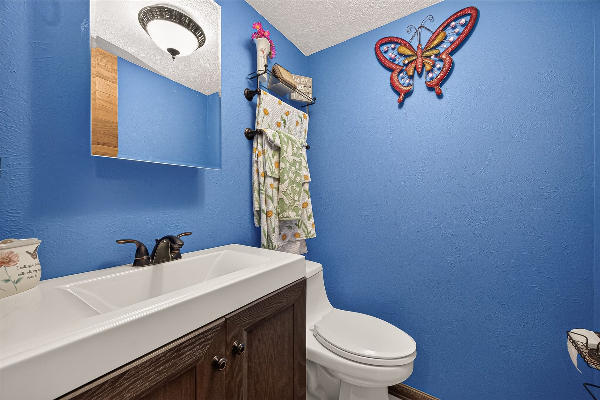 18614 Mink Lake Drive, Magnolia, TX 77355 Half bathroom with a simple, functional layout.