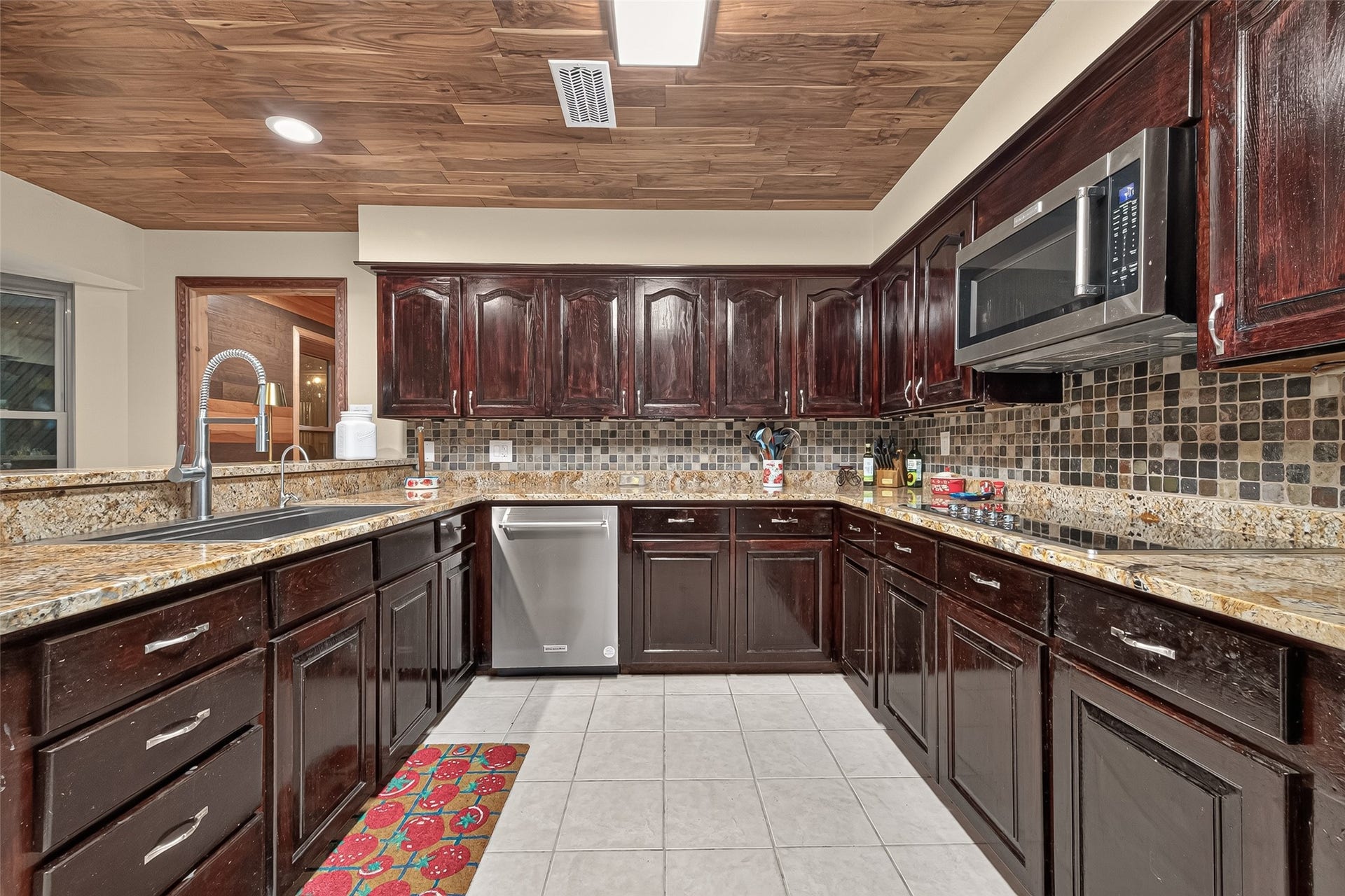 18614 Mink Lake Drive, Magnolia, TX 77355 Another kitchen view highlighting the extensive cabinetry and workspace.