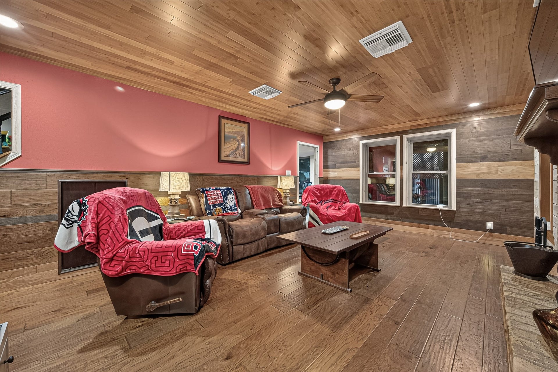 18614 Mink Lake Drive, Magnolia, TX 77355 Spacious living area with a warm, inviting atmosphere.