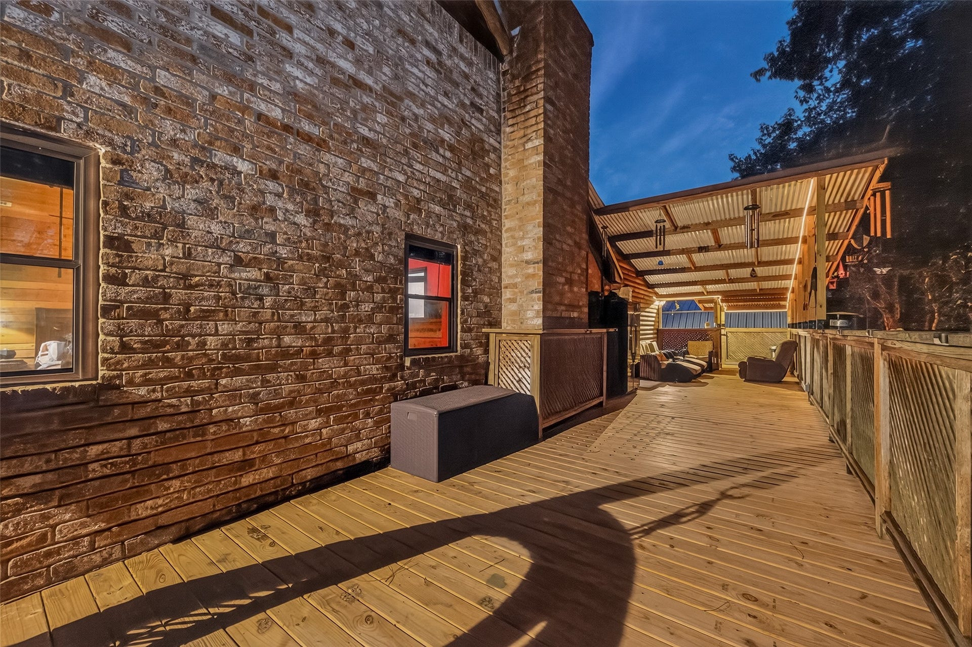 18614 Mink Lake Drive, Magnolia, TX 77355 Outdoor patio area with brick accents and room for gatherings.