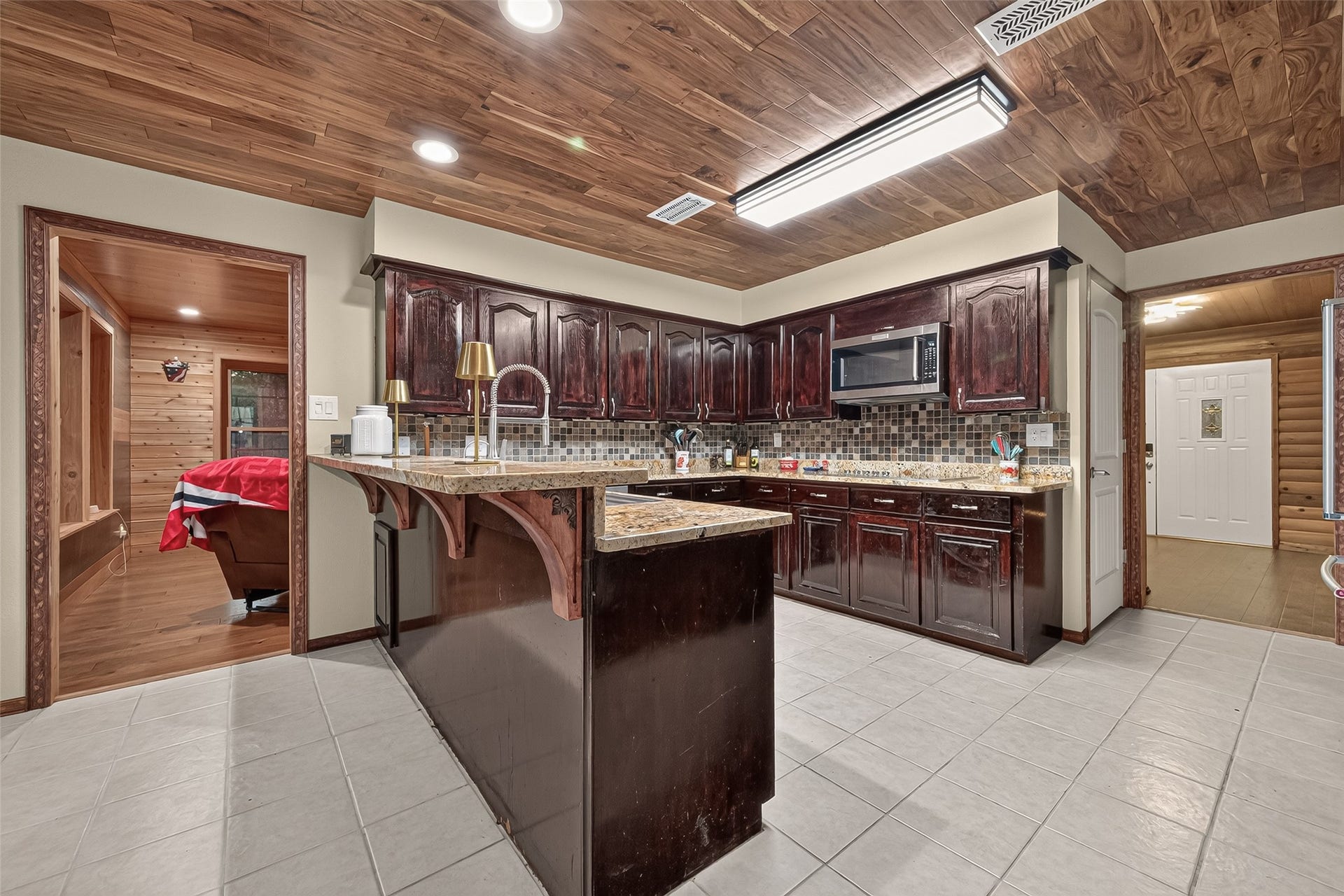 18614 Mink Lake Drive, Magnolia, TX 77355 Generous kitchen with abundant cabinetry, counter space, and a center island.