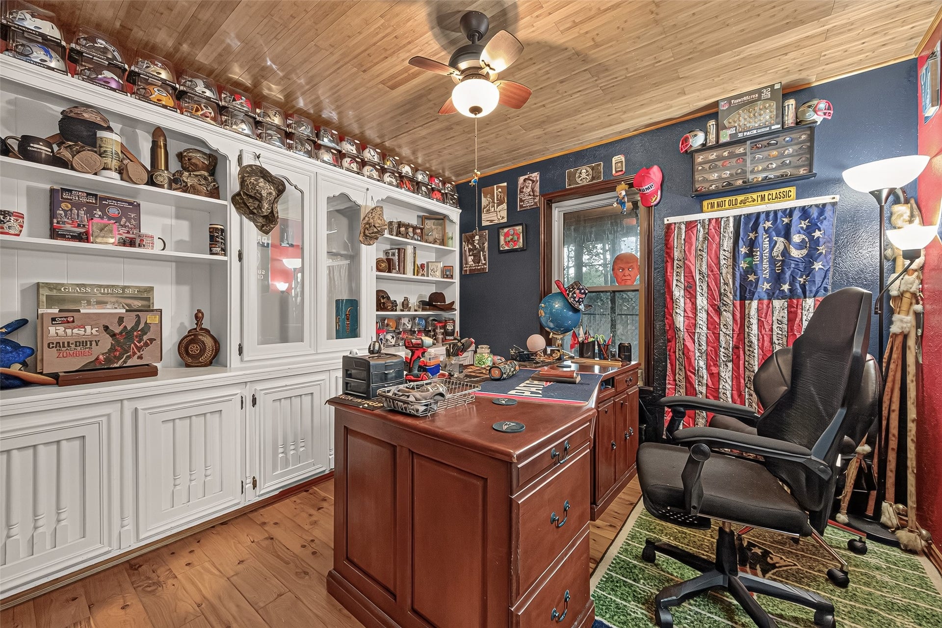 18614 Mink Lake Drive, Magnolia, TX 77355 Dedicated office with built-in shelving and generous workspace.