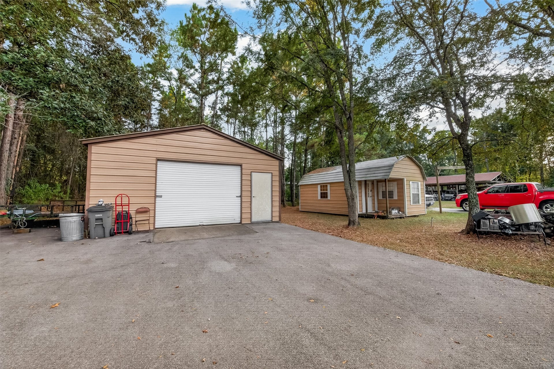 18614 Mink Lake Drive, Magnolia, TX 77355 Detached garage offering additional parking, storage, or workspace.