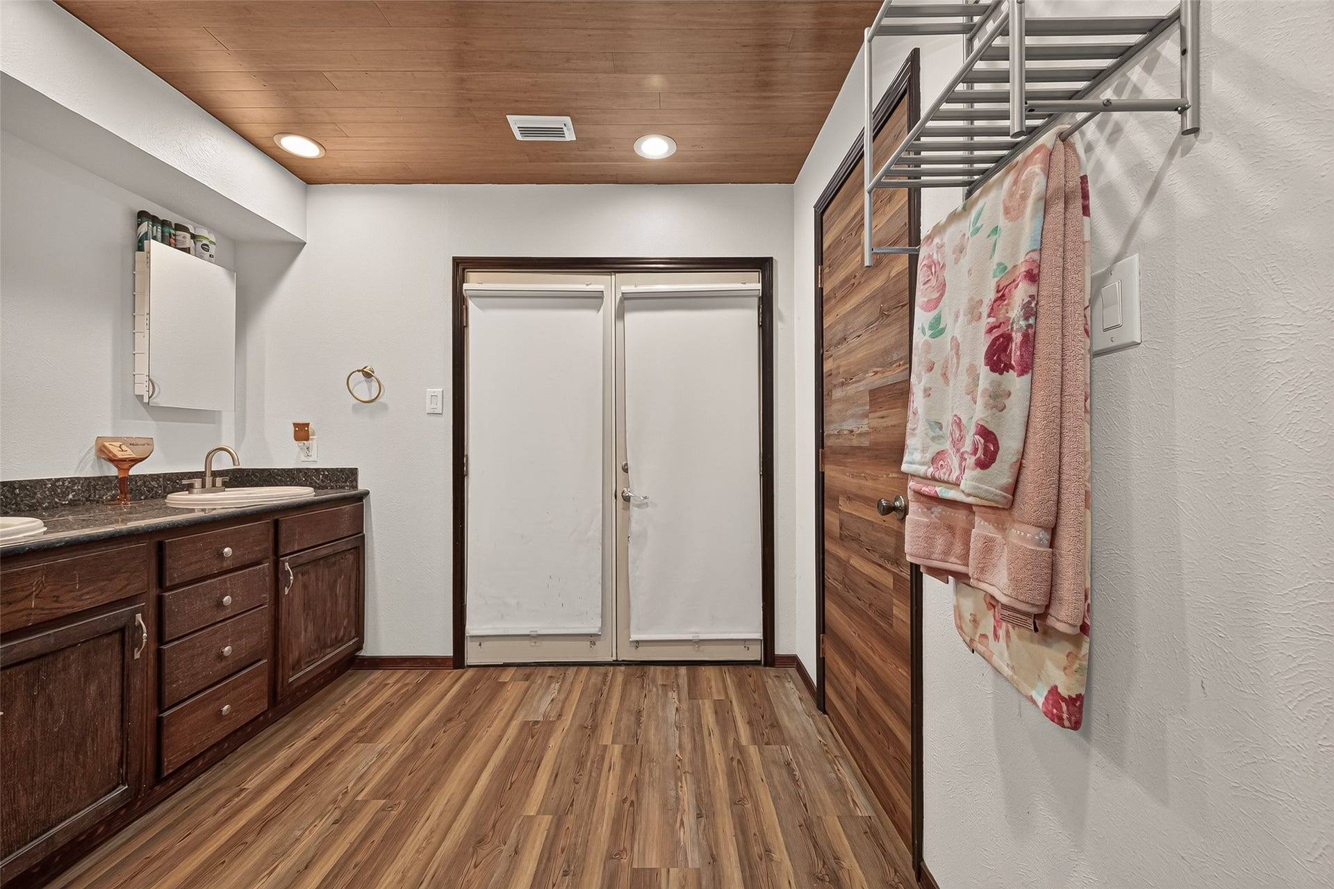 18614 Mink Lake Drive, Magnolia, TX 77355 Bathroom with dual sink and ample storage.