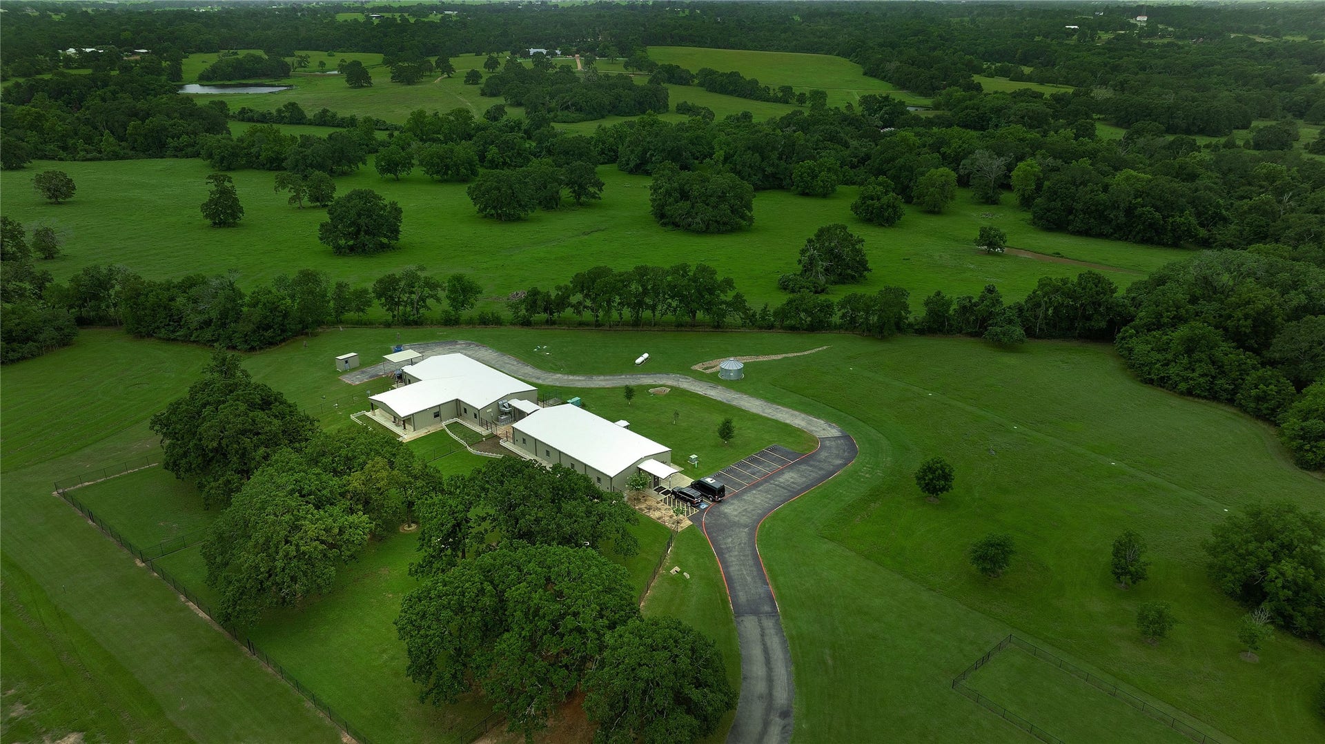40695 Center Hill. This multi purpose building is completely self contained with its own driveway from the entry gates. Ample parking for any business and endless possibilities. The building has its own well, generator and septic. Guest / living quarters.