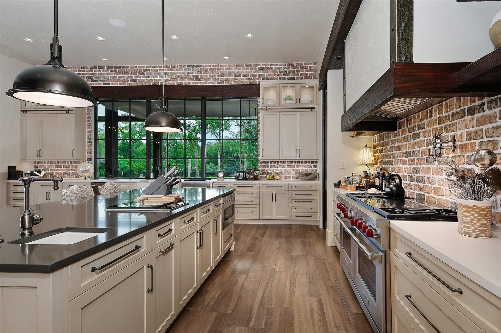 Soft close cabinets and drawers and for those hard to reach areas a kitchen ladder. The farmhouse sink offers back yard views to watch the wildlife.