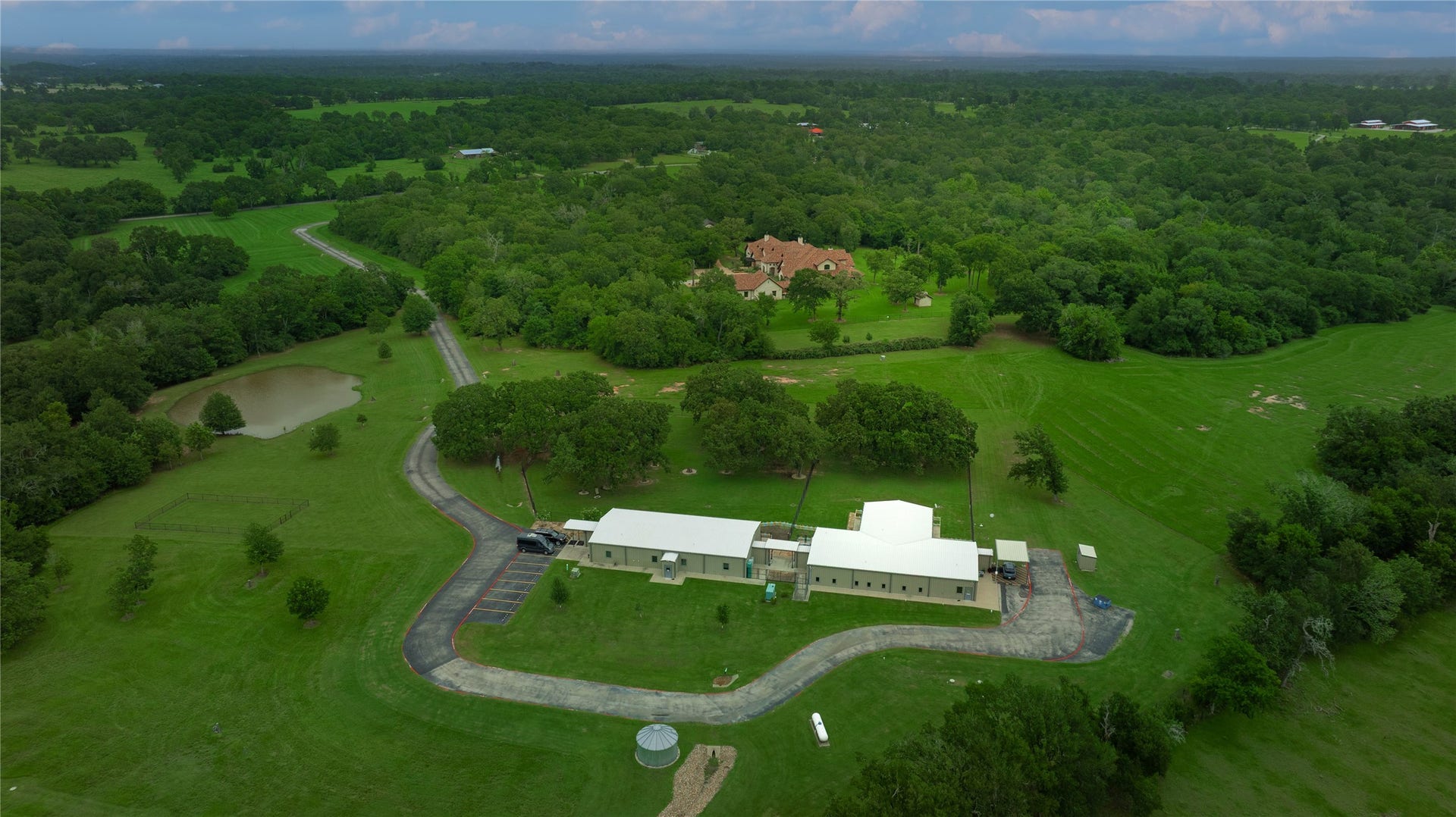 The property combines an equisite Tuscan style primary residence with a 7,720 sq ft multi purpose building. Whether you are looking for a home for a personal Car collection, Recording studio, Home Business or an Equestrian facility this property has so much to offer.
