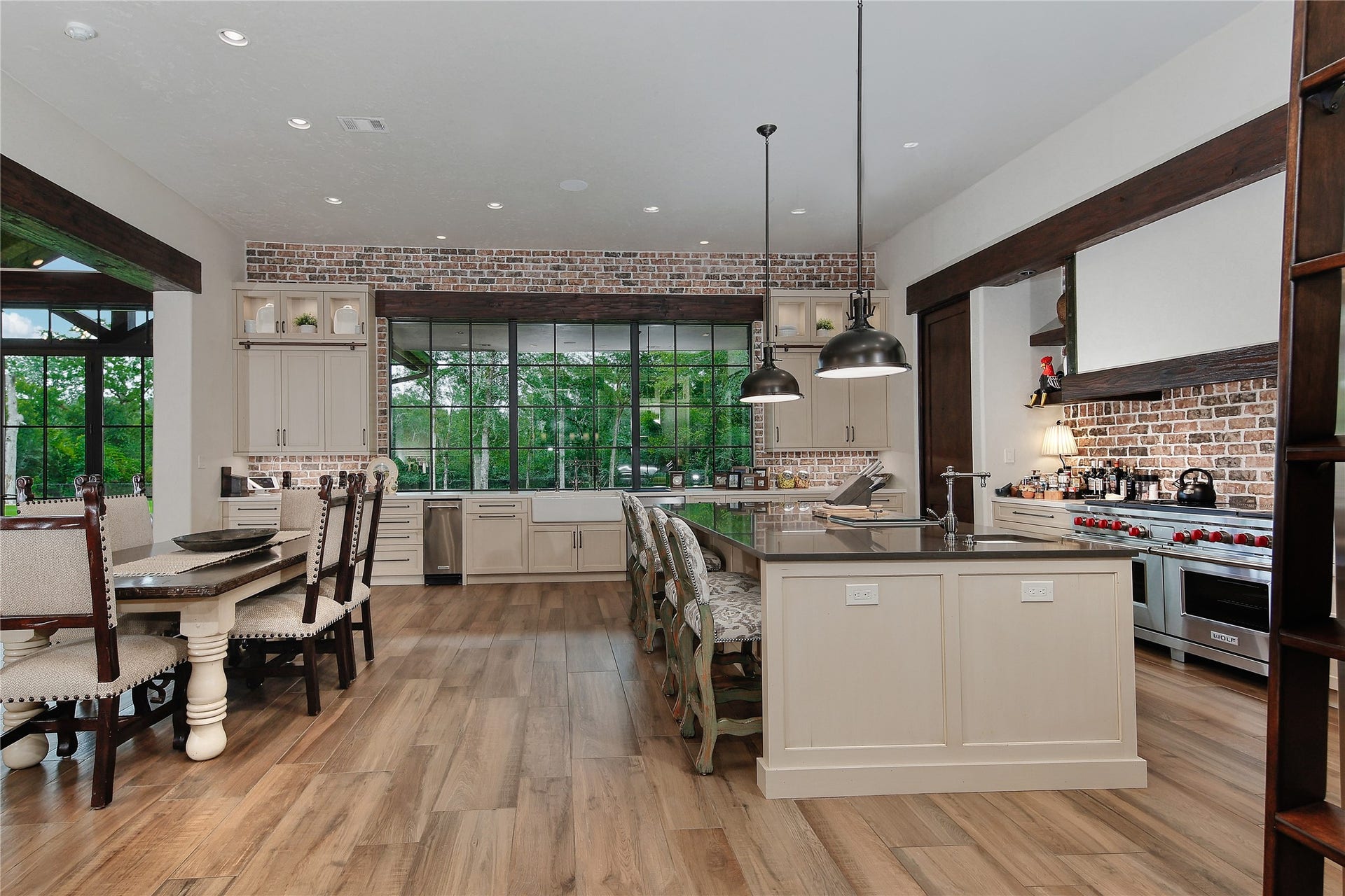 Designed and built by Bentwood of Houston this outstanding kitchen is a chefs dream! Only the best applainaces including a 60 inch dual fuel Wolf oven, Sub Zero refrigerator, Asko dishwasher and Scotsman ice maker.