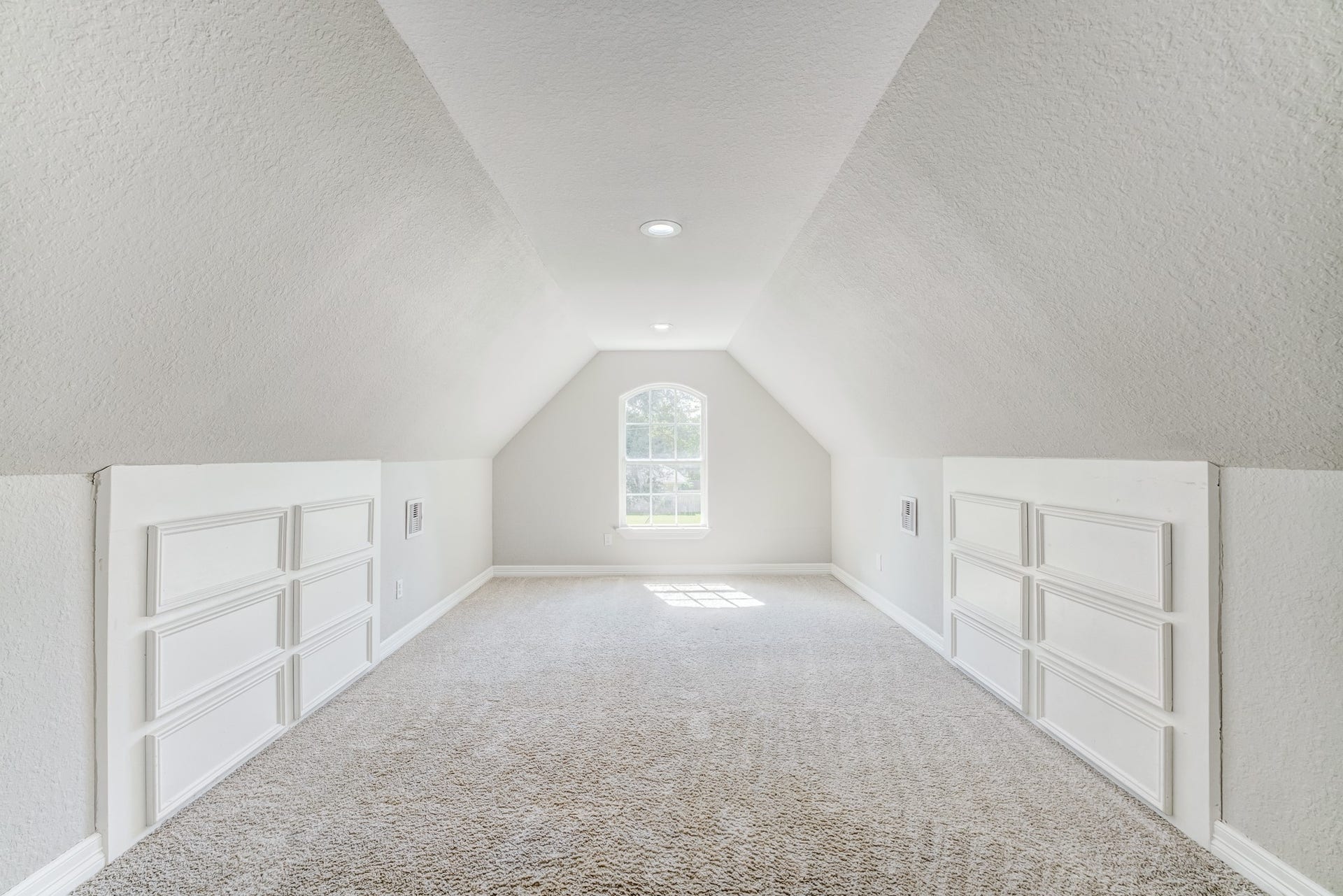 Spacious upstairs bonus room offering flexible use for a game room, media room, or home office.