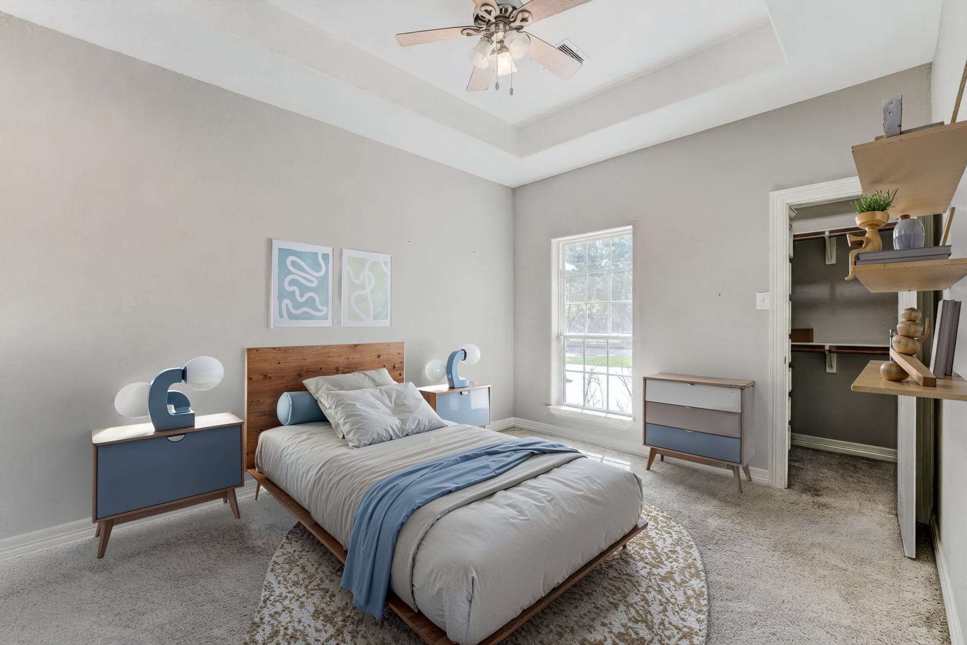 **Virtually Staged** Secondary bedroom with plush carpeting, large closet, and natural light.
