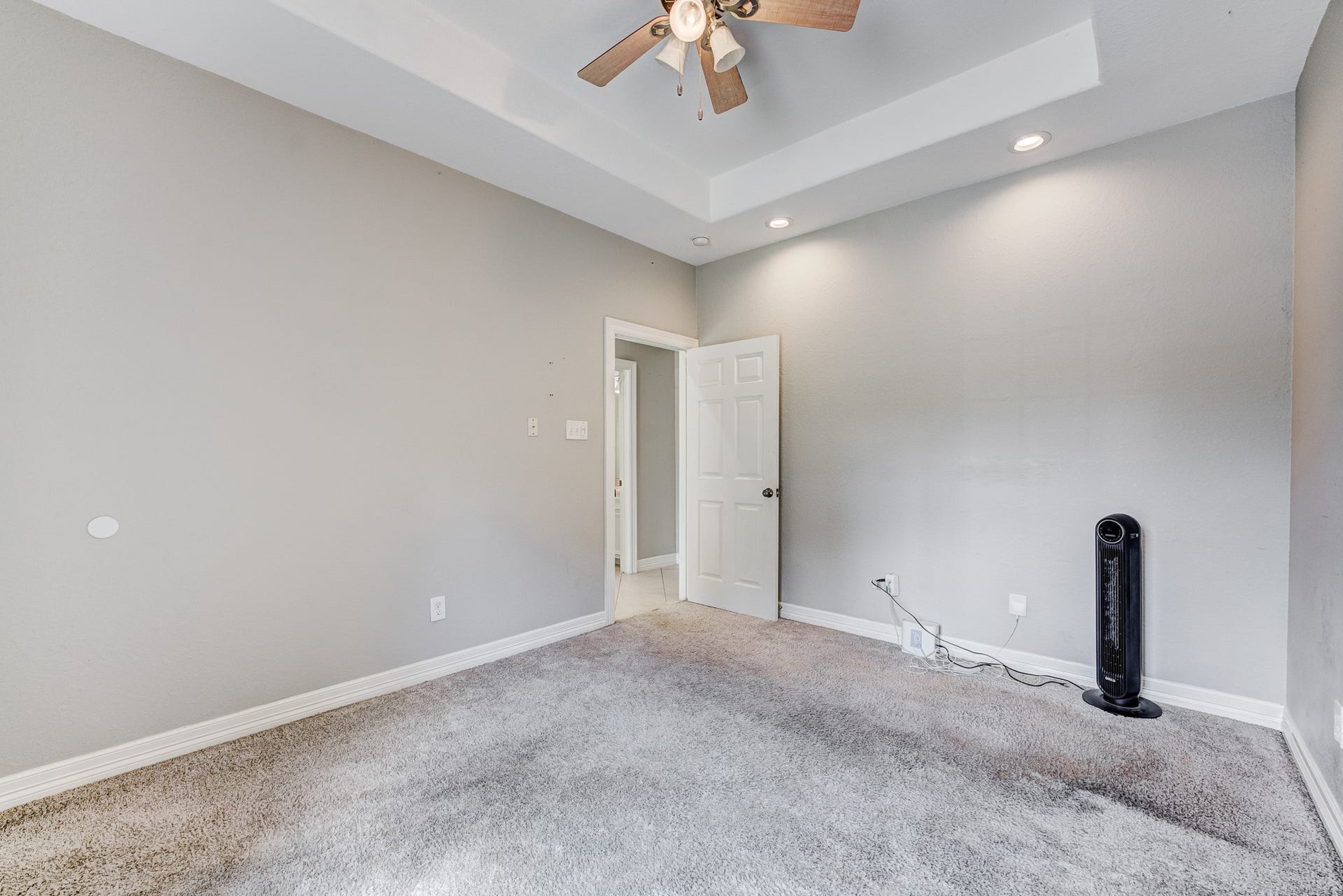 Versatile guest bedroom suitable for family, visitors, or a home office.