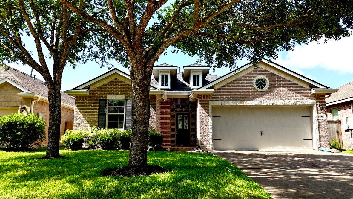 24531 Via Salerno Court, Richmond, TX 77406 Welcome home. New landscaping
and newly installed sprinkler system.
