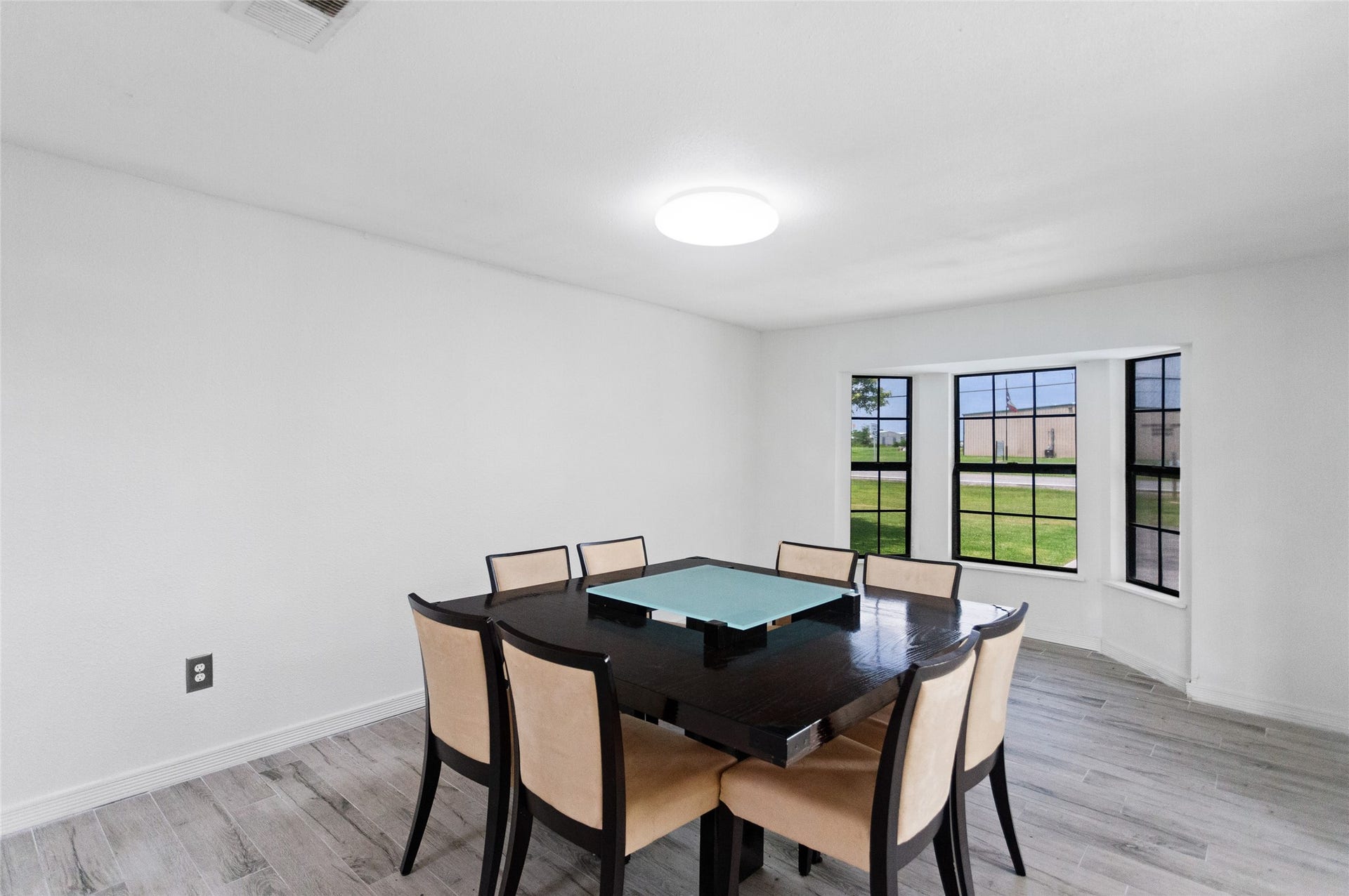 5001 Texas Avenue, La Marque, TX 77568 Bright and inviting formal dining room filled with natural light from bay windows!