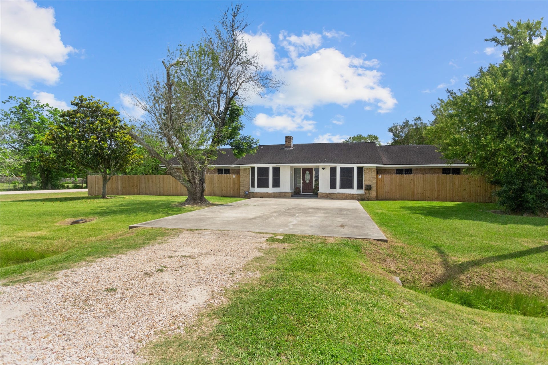 5001 Texas Avenue, La Marque, TX 77568 Room for 6 vehicles in the front of the house to park on this large corner lot!
