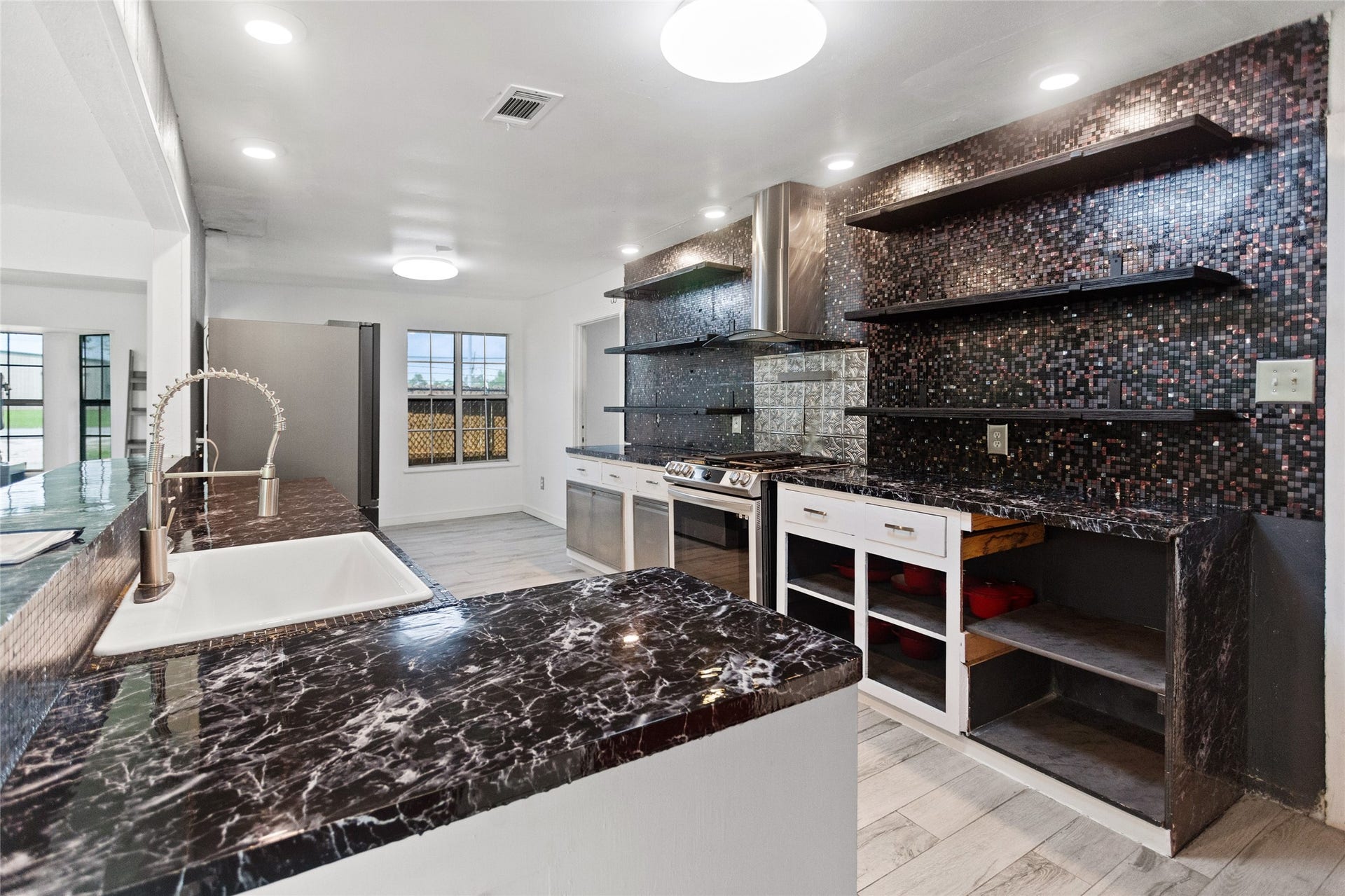 5001 Texas Avenue, La Marque, TX 77568 Plenty of room in this sleek kitchen with room for a breakfast table by the window to enjoy the morning light!
