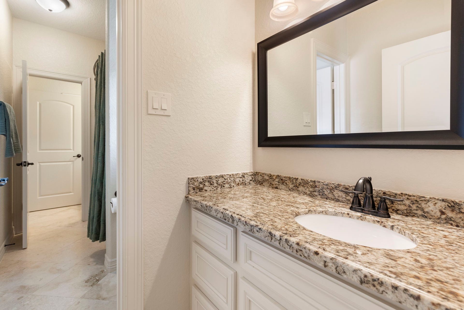 Private vanity area for Bedroom 3.