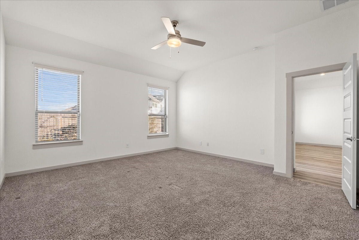 716 Westwood Drive, League City, TX 77573 Spacious primary bedroom offering a comfortable retreat with room to relax and unwind.