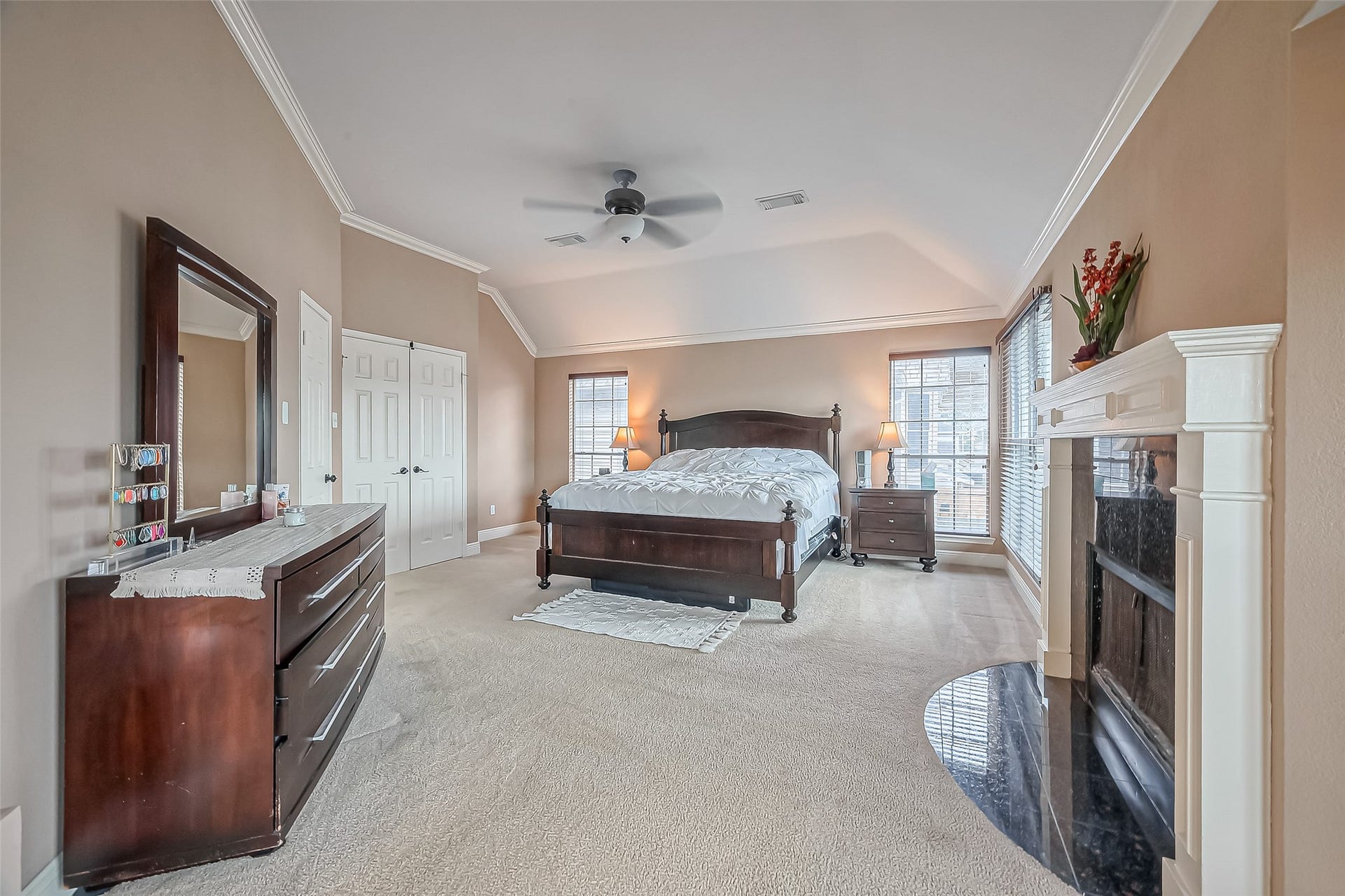 Very spacious master suite with a cozy fireplace