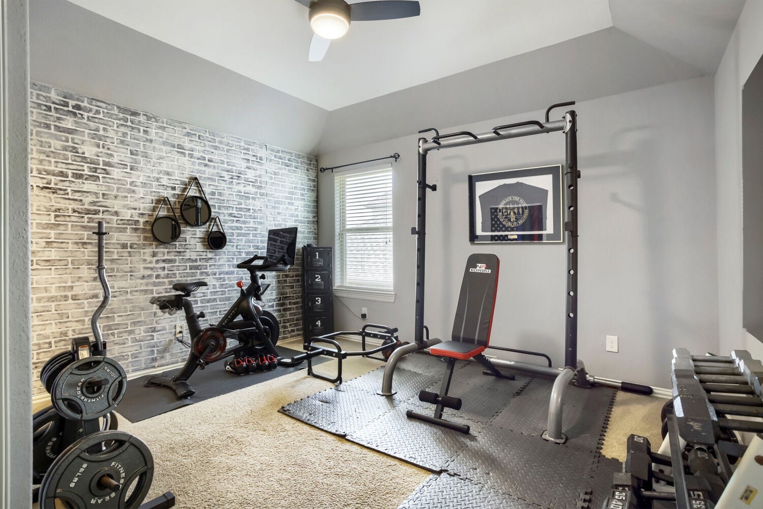 Bedroom utilized as a home gym