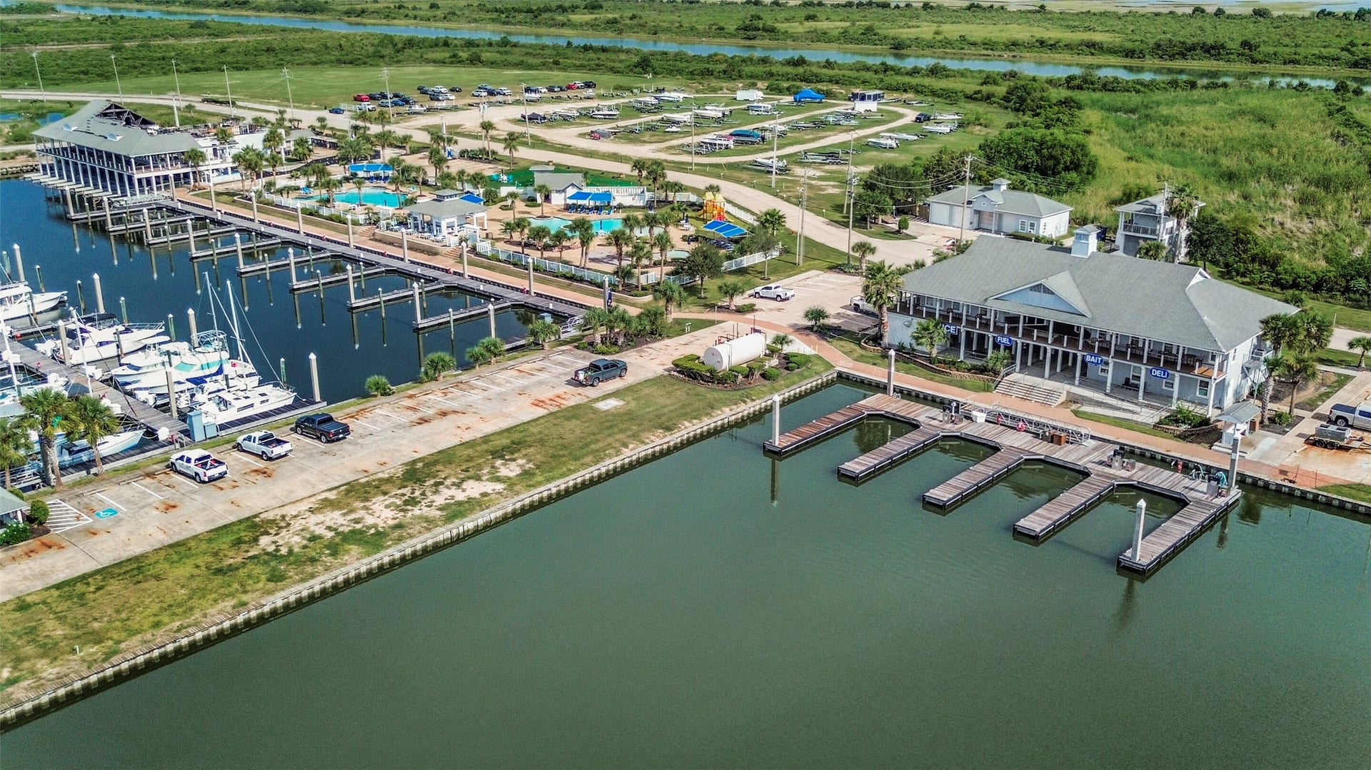 22 Fleming, Hitchcock, TX 77563 Waterfront living takes center stage in HarborWalk. The community offers a private marina, boat ramp, boat dock and boating access for an easy transition from home to open water.