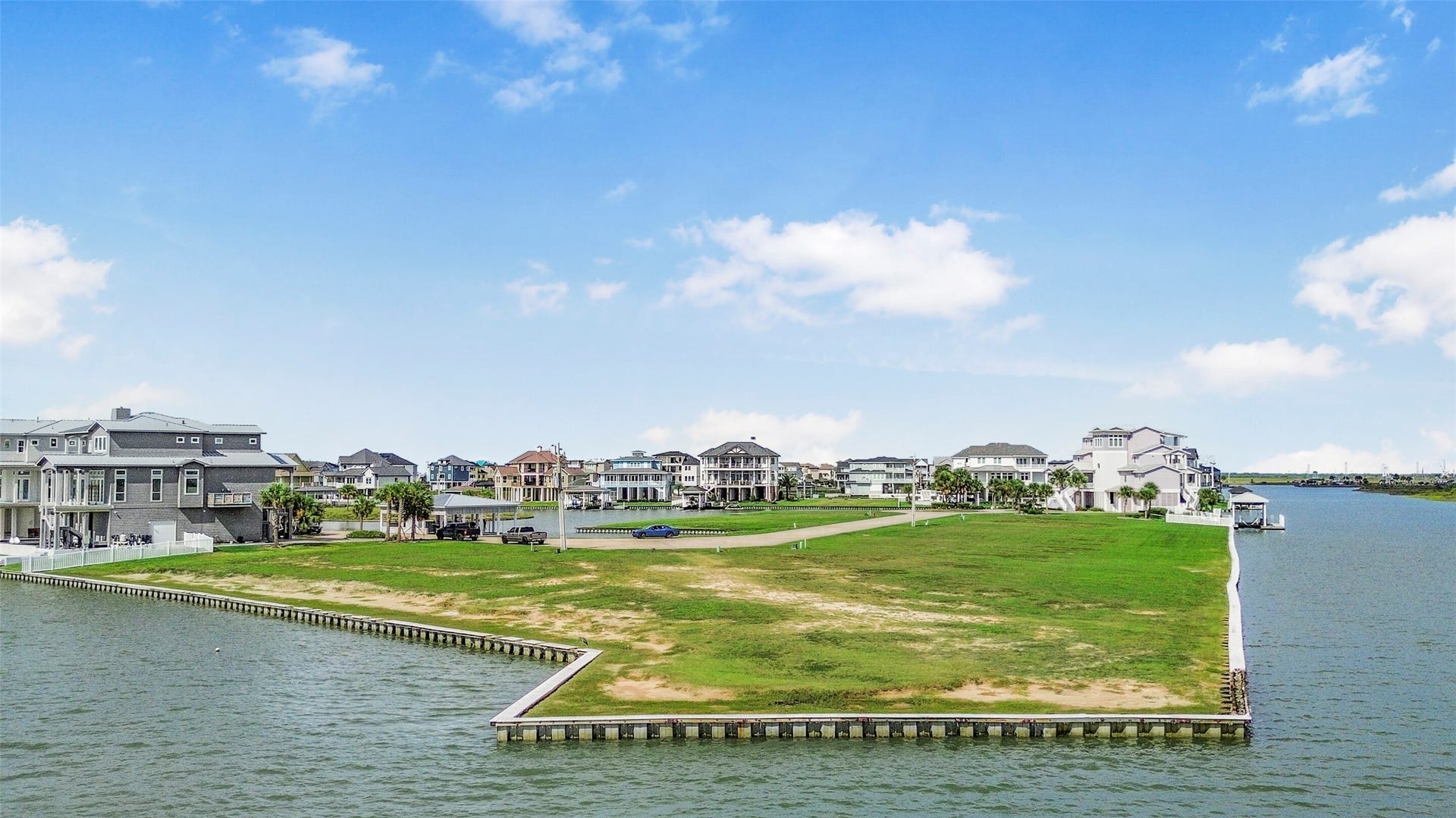 22 Fleming, Hitchcock, TX 77563 The canal front setting provides the perfect backdrop for a custom coastal home. With the bulkhead and boatlift already established, some of the waterfront infrastructure is already in place.