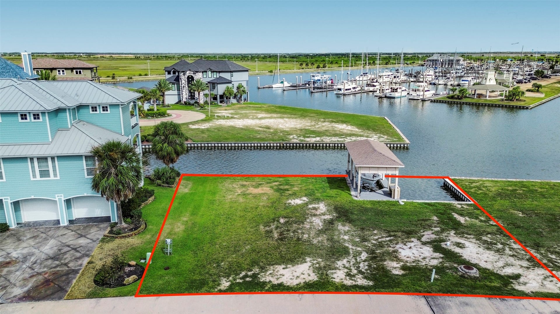 22 Fleming, Hitchcock, TX 77563 Aerial view showcasing the canal front setting of 22 Fleming and its proximity to HarborWalks extensive waterways. Build your custom coastal home and create the waterfront lifestyle you have been envisioning.