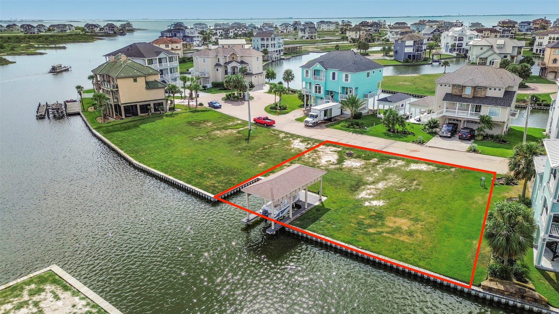 22 Fleming, Hitchcock, TX 77563 The fully constructed boatlift is included with the lot, adding immediate value for boating enthusiasts. Electricity and a fish cleaning station are already in place, making it easier to enjoy the waterfront while planning your future home.