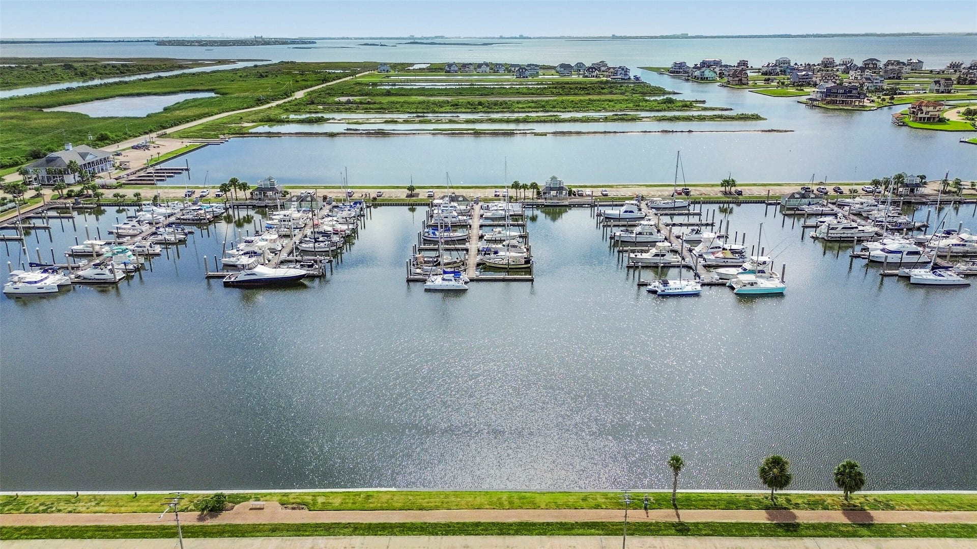22 Fleming, Hitchcock, TX 77563 Boaters and anglers will love HarborWalks direct connection to the surrounding waterways and West Galveston Bay. Keep your boat close and make spontaneous days on the water part of your everyday lifestyle.