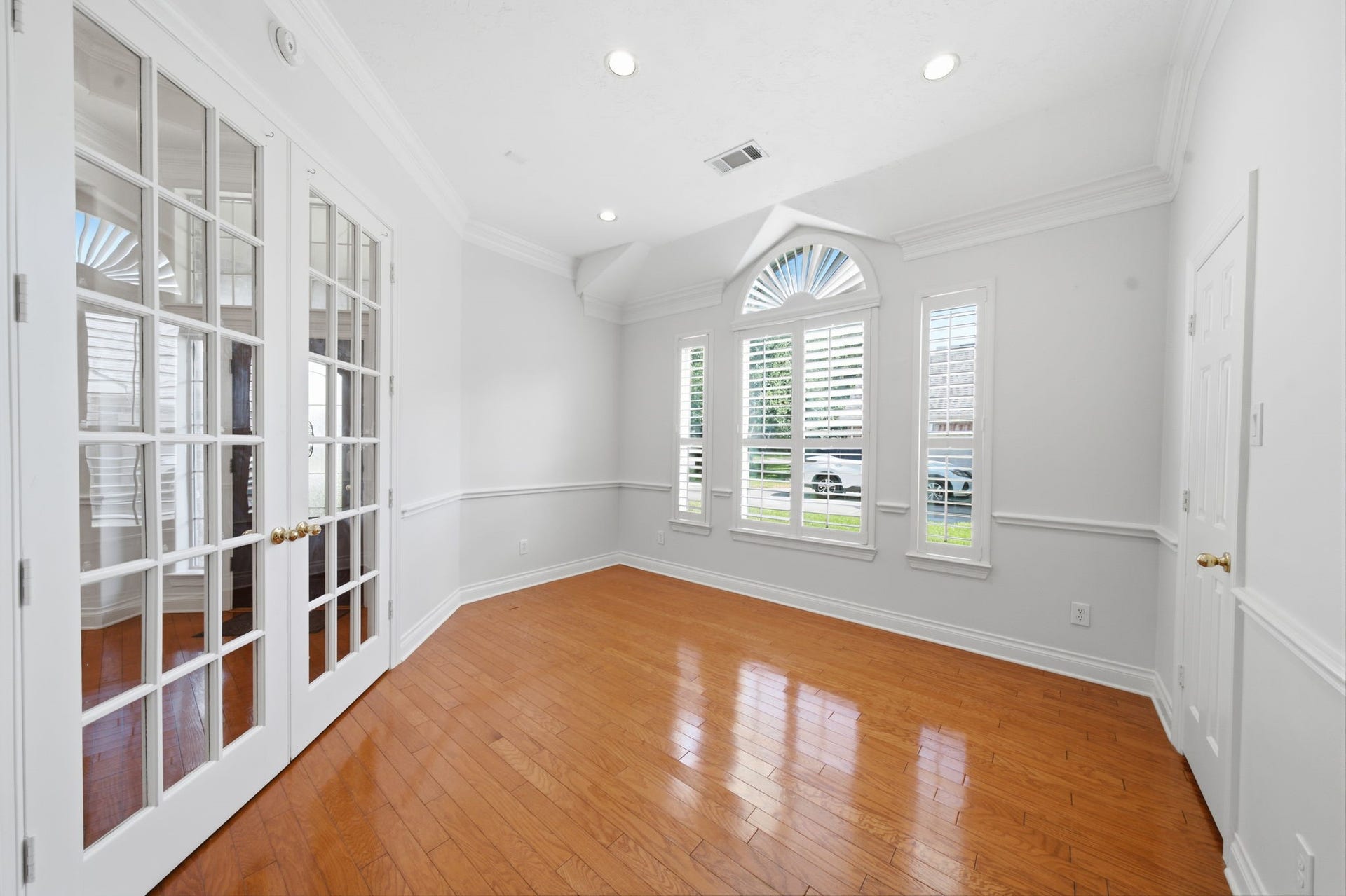 1227 Wellshire Drive, Katy, TX 77494 The study offers a quiet working area with plantation blinds.