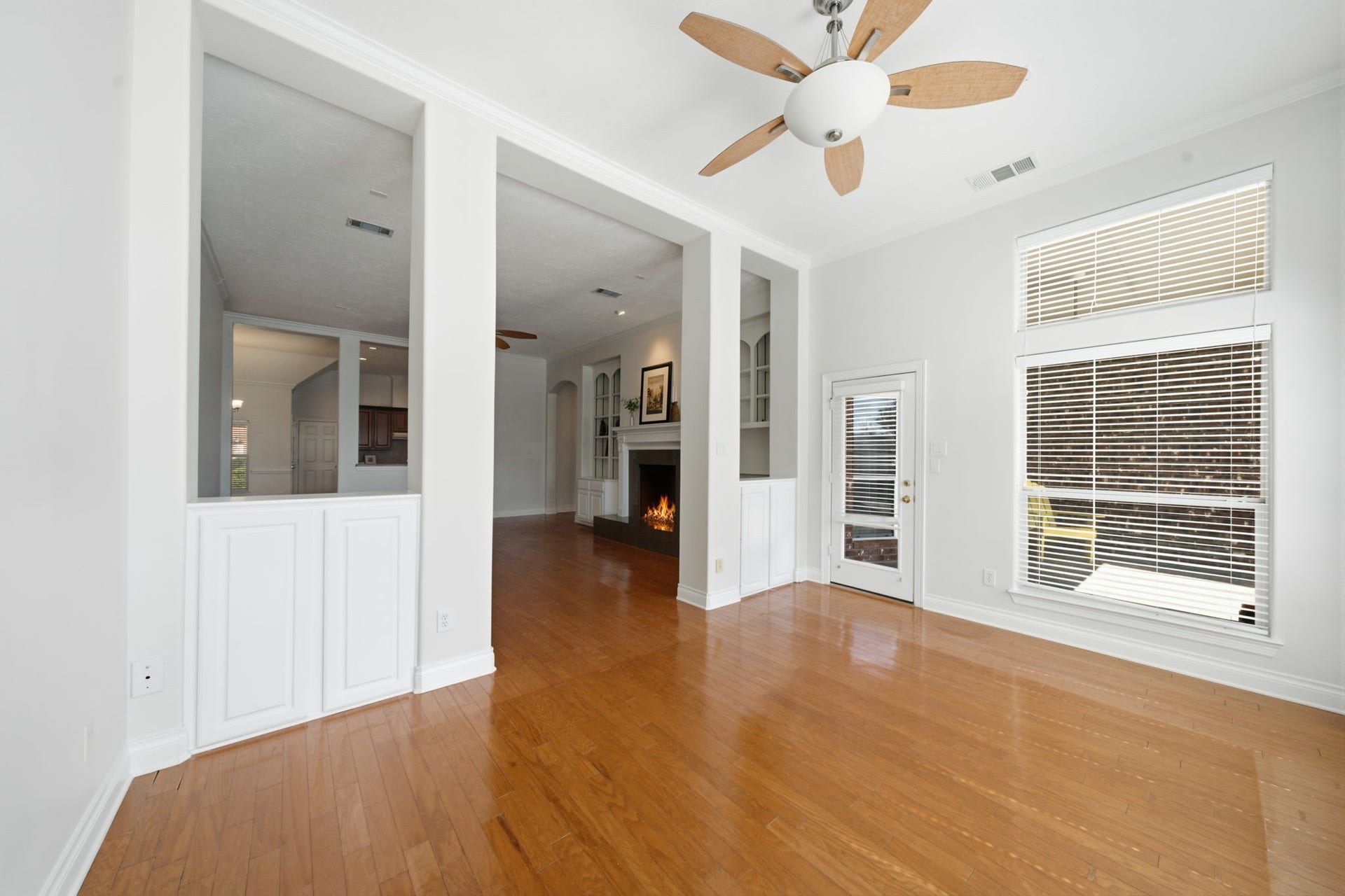1227 Wellshire Drive, Katy, TX 77494 The sunroom includes a door to the back patio.