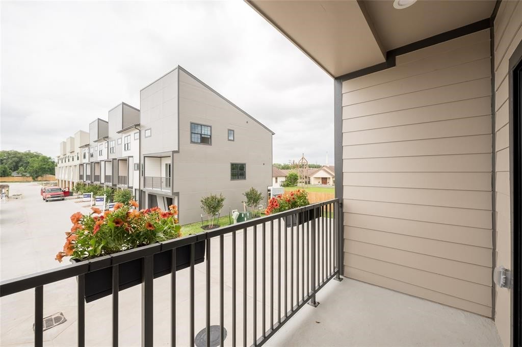 4406 W Hoa Sen Circle, Houston, TX 77072 Private balcony offers a relaxing outdoor retreat to enjoy fresh air and neighborhood views.