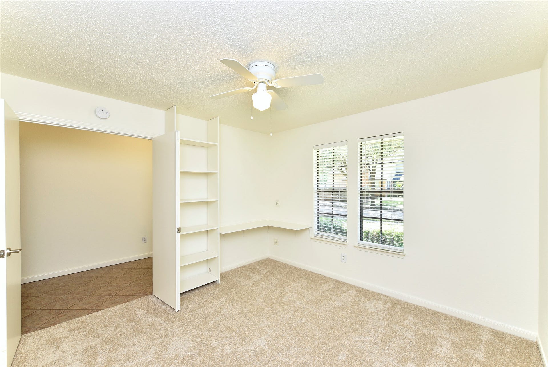 2035 Shorewood Lane, Sugar Land, TX 77479 Another view of front bedroom with built in desk.